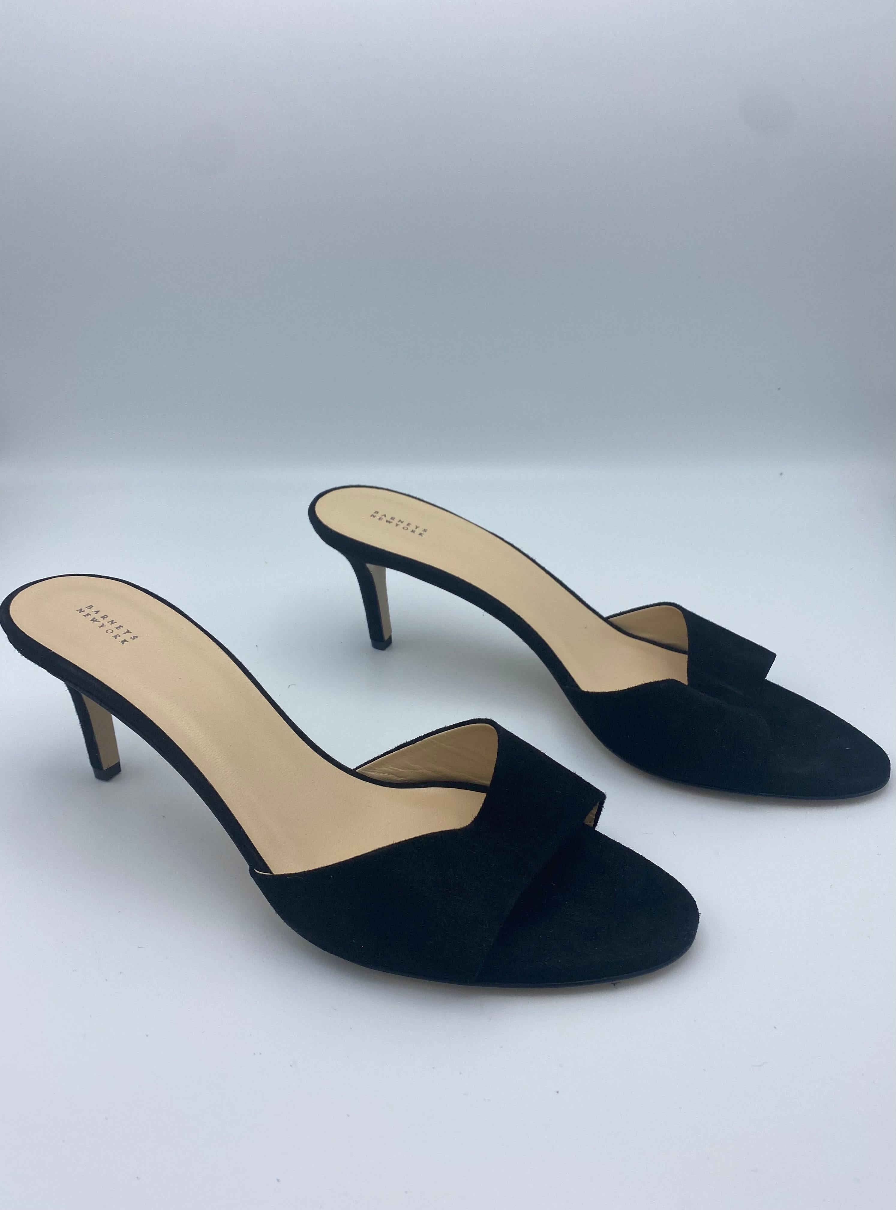 These black suede heels from Barney's New York. They feature open toe and the heel height is 3 inches. Perfect condition, does not come with the box. 