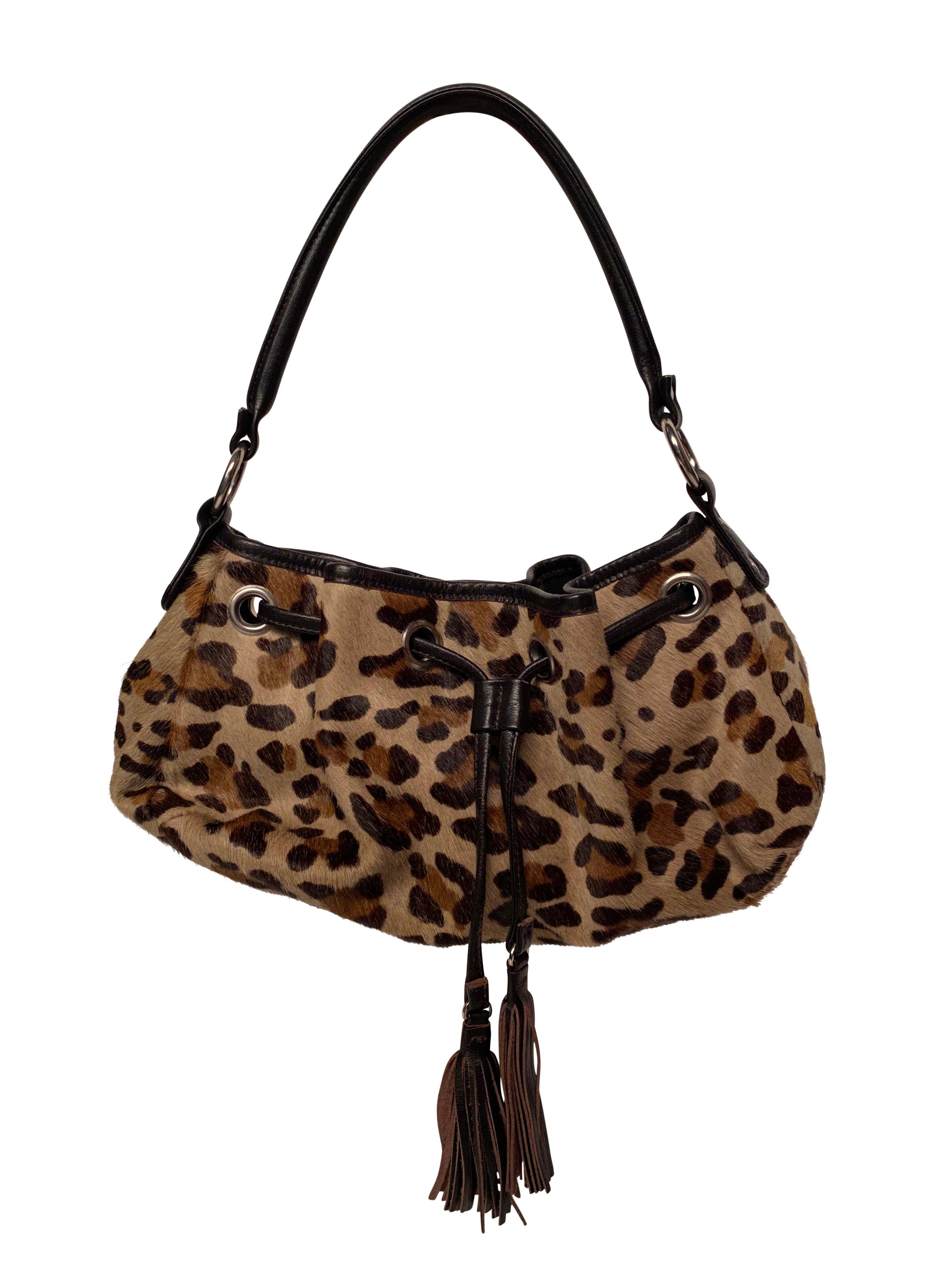 Vintage Barneys New York leopard printed pony hair handbag with fabric interior. 