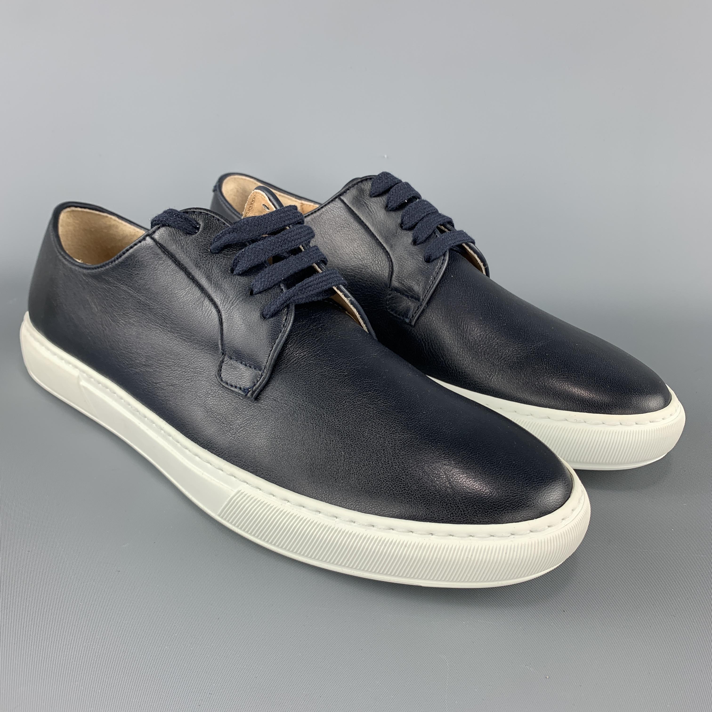 BARNEY'S NEW YORK low top sneakers come in navy blue leather with a white rubber sole. Made in Italy.

New with Box.
Marked: US 13

Outsole: 12.5 x 4.25 in.