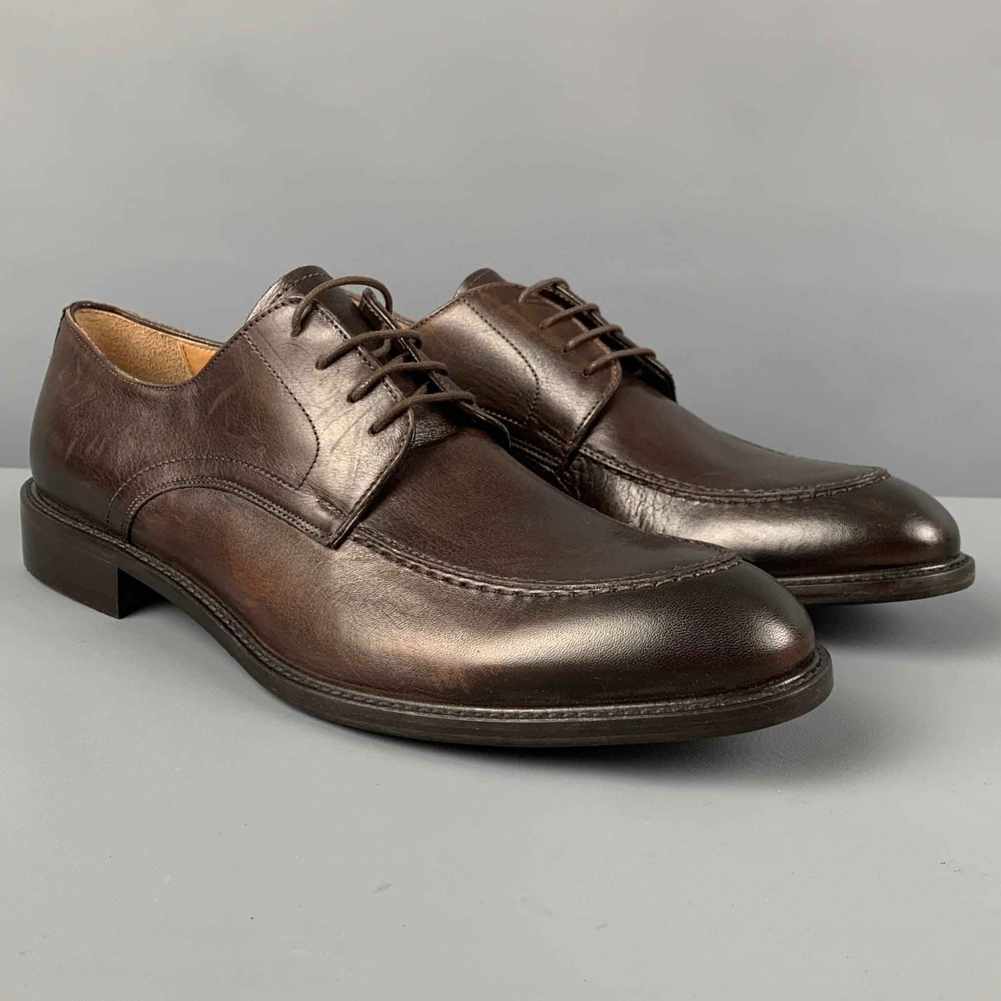BARNEY'S NEW YORK shoes comes in a brown antique leather featuring top stitching an a lace up closure. Made in Italy.
 Very Good
 Pre-Owned Condition. 
 

 Marked:  11Outsole: 12.5 inches x 4.25 inches 
  
  
  
 Sui Generis Reference: 119564
