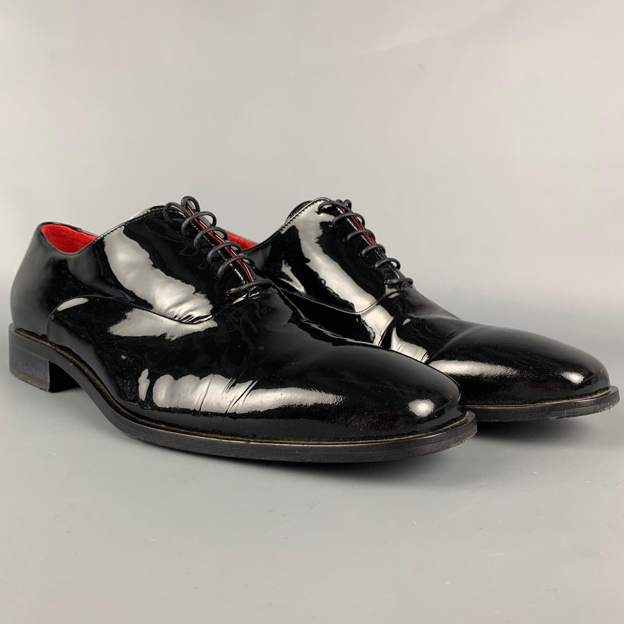 BARNEY'S NEW YORK shoes comes in black patent leather featuring a square toe and a lace up closure. Includes box. Made in Italy.
 Very Good Pre-Owned Condition. 
 

 Marked:  1059 12 MOutsole: 12.5 inches x 4.25 inches  
  
  
  
 Sui Generis