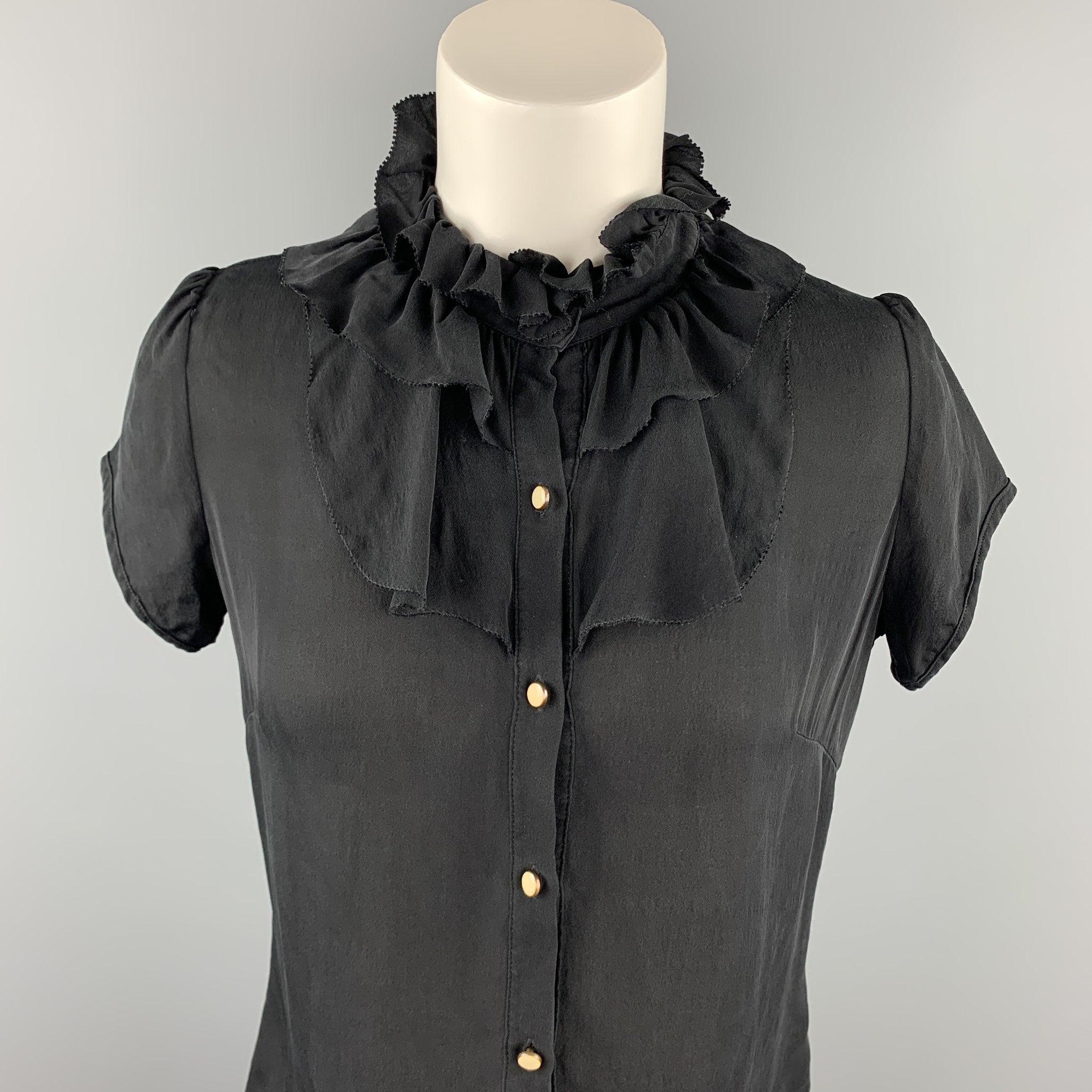 BARNEY'S NEW YORK blouse comes in a black silk featuring a front ruffled design and buttoned closure.
 Very Good
 Pre-Owned Condition. 
 

 Marked:  2 
 

 Measurements: 
  
 Shoulder: 13.5 inches 
 Bust: 34 inches 
 Sleeve: 5.5 inches 
 Length: 22