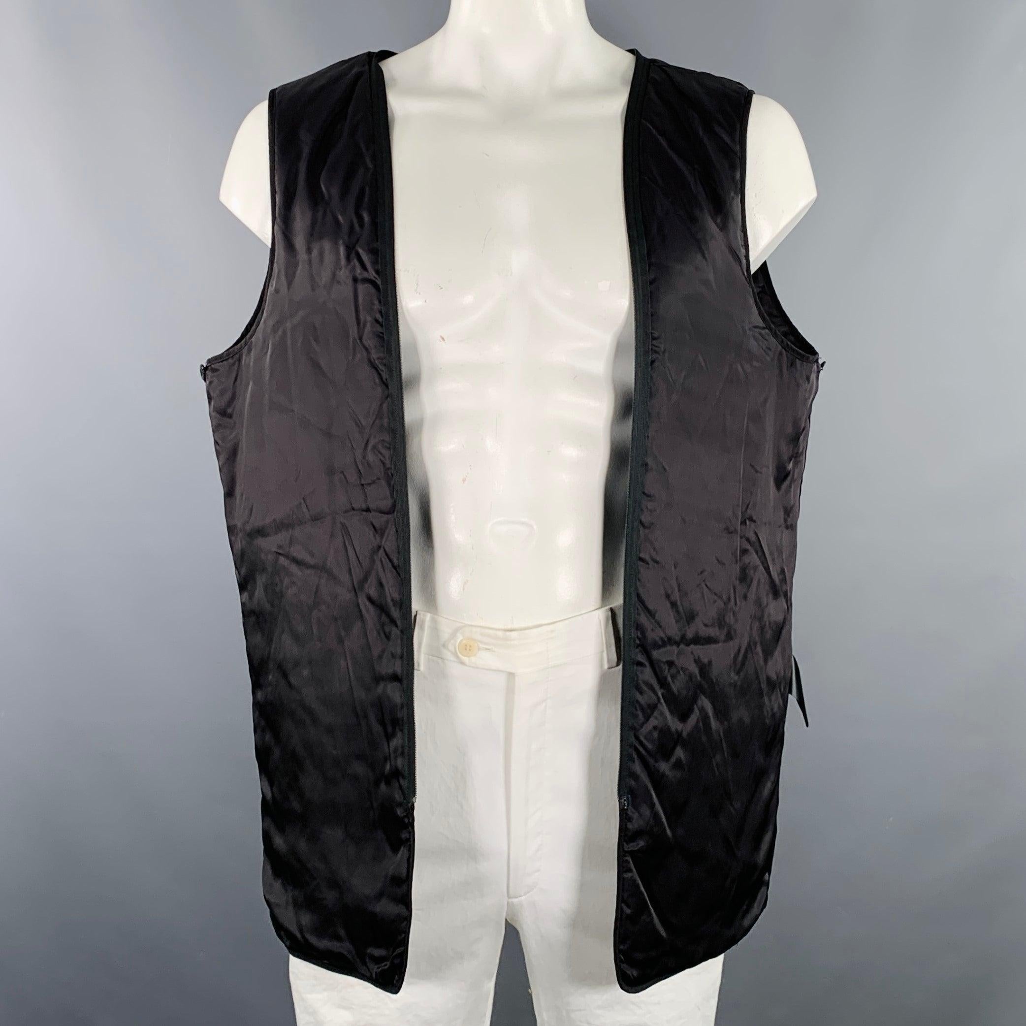 BARNEYS NEW YORK coat
in a black cotton woven fabric featuring removable quilted lining, trench style, and hidden button closure. Very Good Pre-Owned Condition. Multiple minor marks. 

Marked:   46 

Measurements: 
 
Shoulder: 18.5 inches Chest: 51