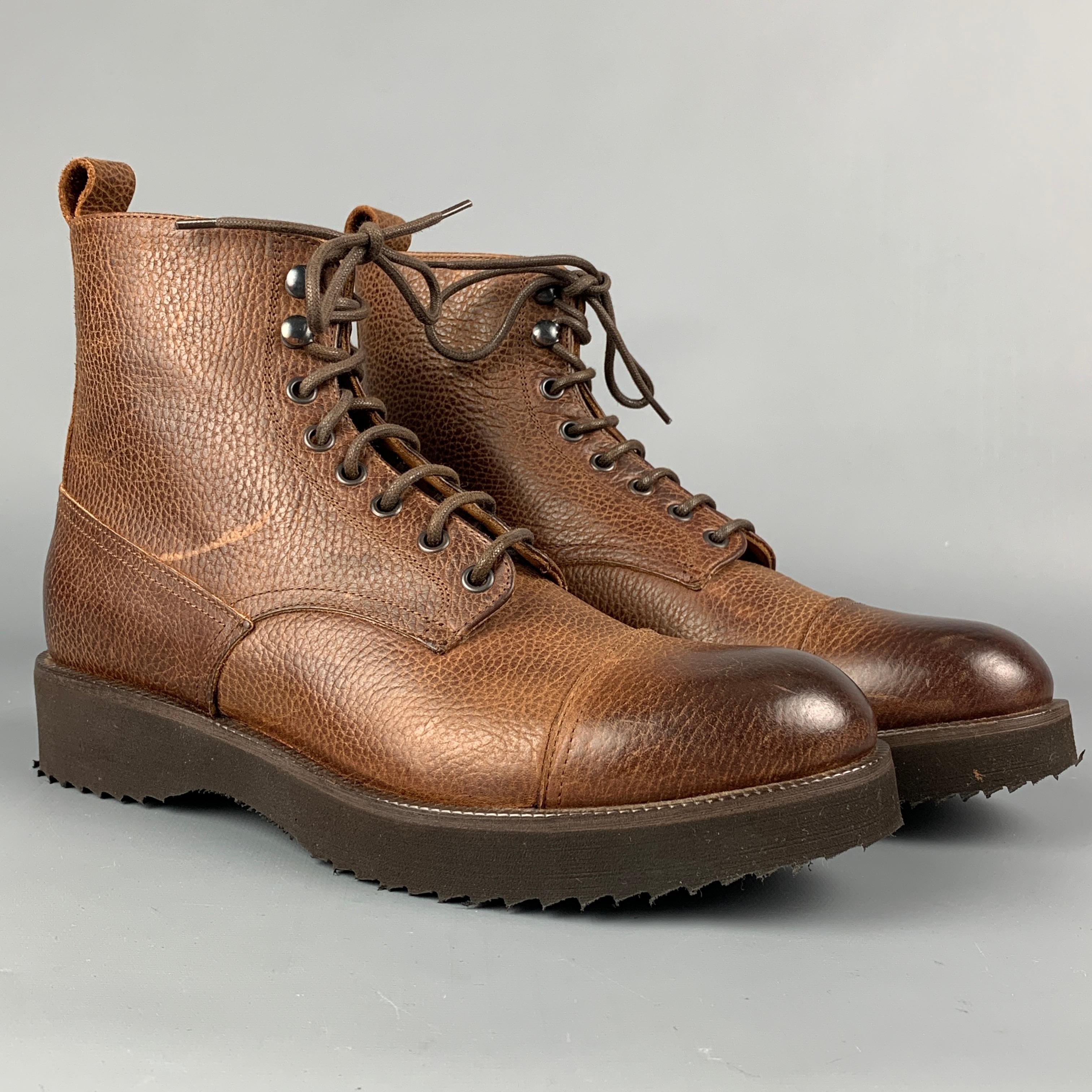 BARNEY'S NEW YORK boots comes in a brown antique leather featuring a cap te, rubber sole, and a lace up closure. 

New With Box.
Marked: 8 M

Measurements:

Length: 11.5 in.
Width: 4 in.
Height: 5.5 in. 