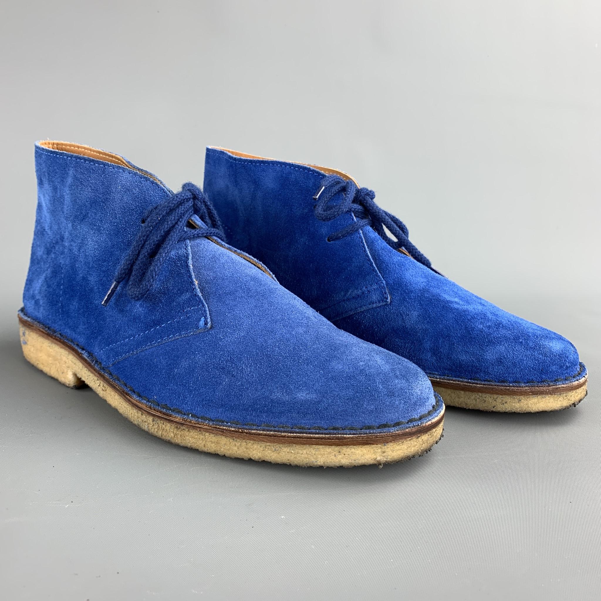 BARNEY'S NEW YORK lace up boots comes in a royal blue suede featuring a desert style and a crepe sole.

Good Pre-Owned Condition.
Marked: 7

Outsole:

10.5 in. x 4 in. 
