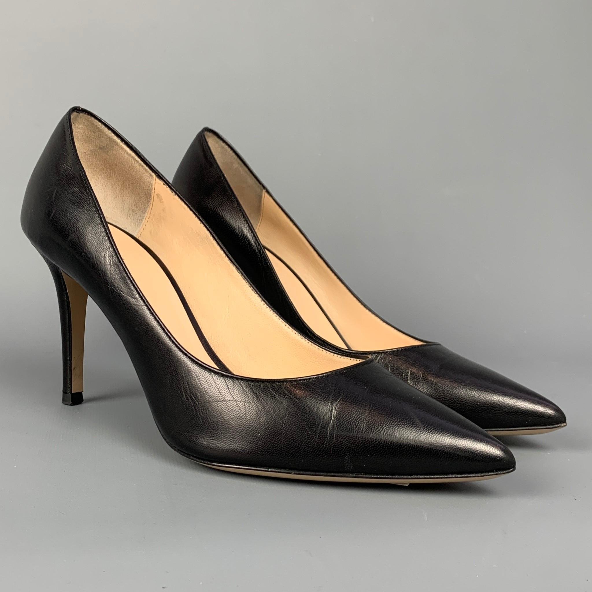 BARNEY'S NEW YORK pumps comes in a black leather featuring a classic style and a pointed toe. Minor wear. Made in Italy.

Very Good Pre-Owned Condition.
Marked: EU 38.5

Measurements:

Heel: 3.5 in.