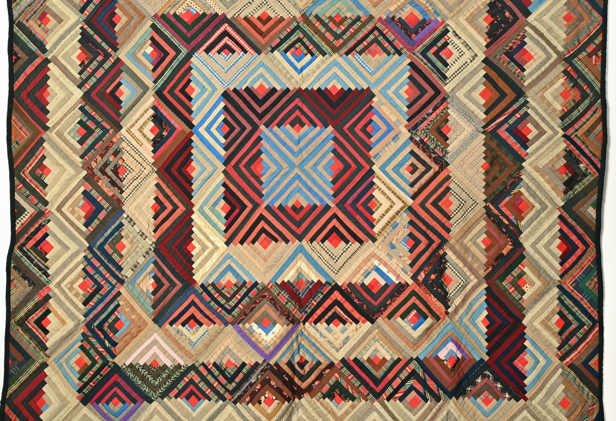 Il più delle volte, i quilt del Barnraising sono disposti su un diamante. In questo quilt, è realizzato a quadretti.

La trapunta è realizzata interamente in lana con un fondo in flanella di cotone. Ha una bella disposizione di luci e ombre. I