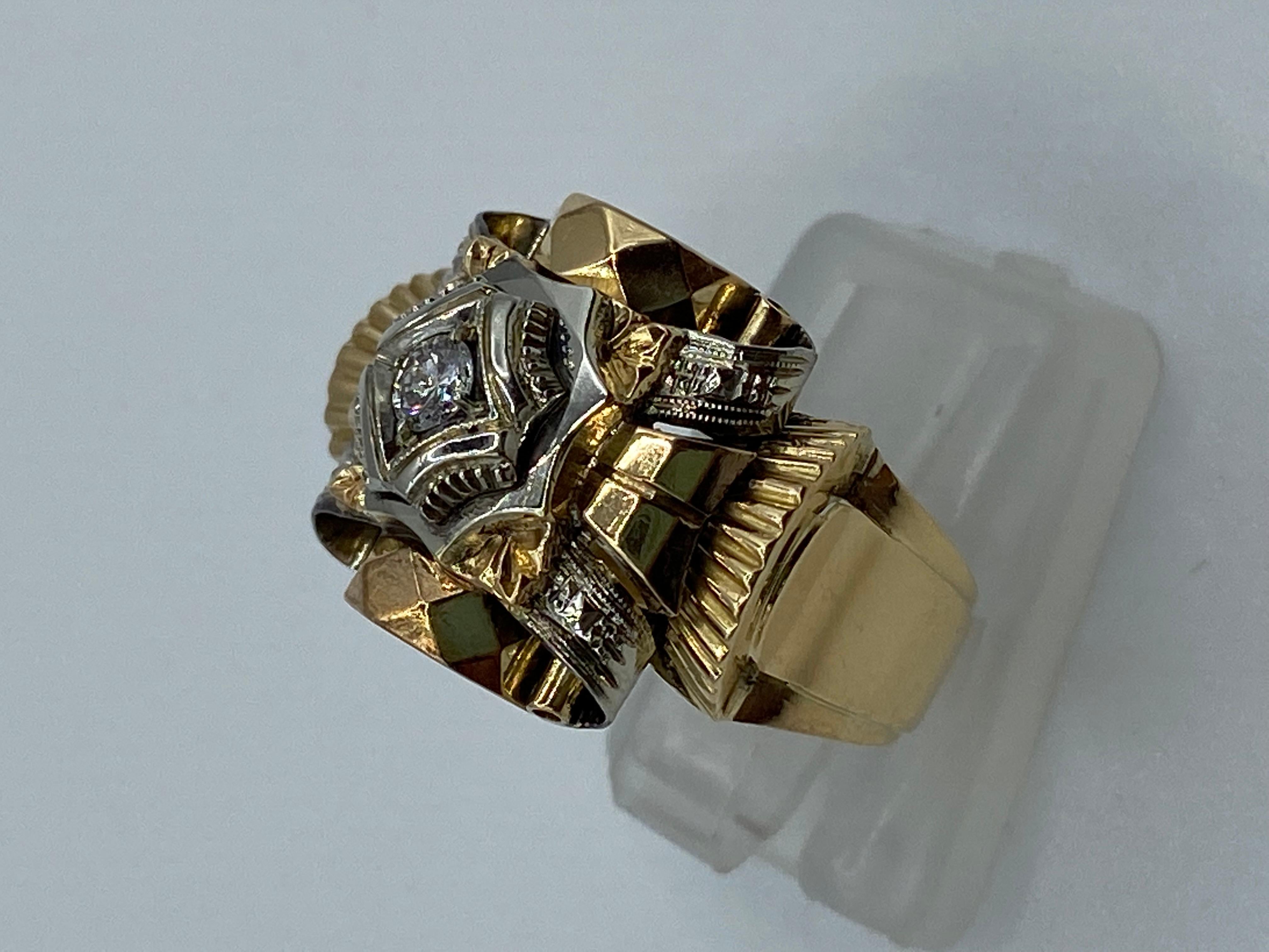 Barocco ring in 18 kt gold and brilliant cut diamond 0.10 ct, three-tone gold. It dates back to the 1950s, a very valuable manufacture typical of the time.Considering its seventy years it is in excellent condition, although it shows signs of age.