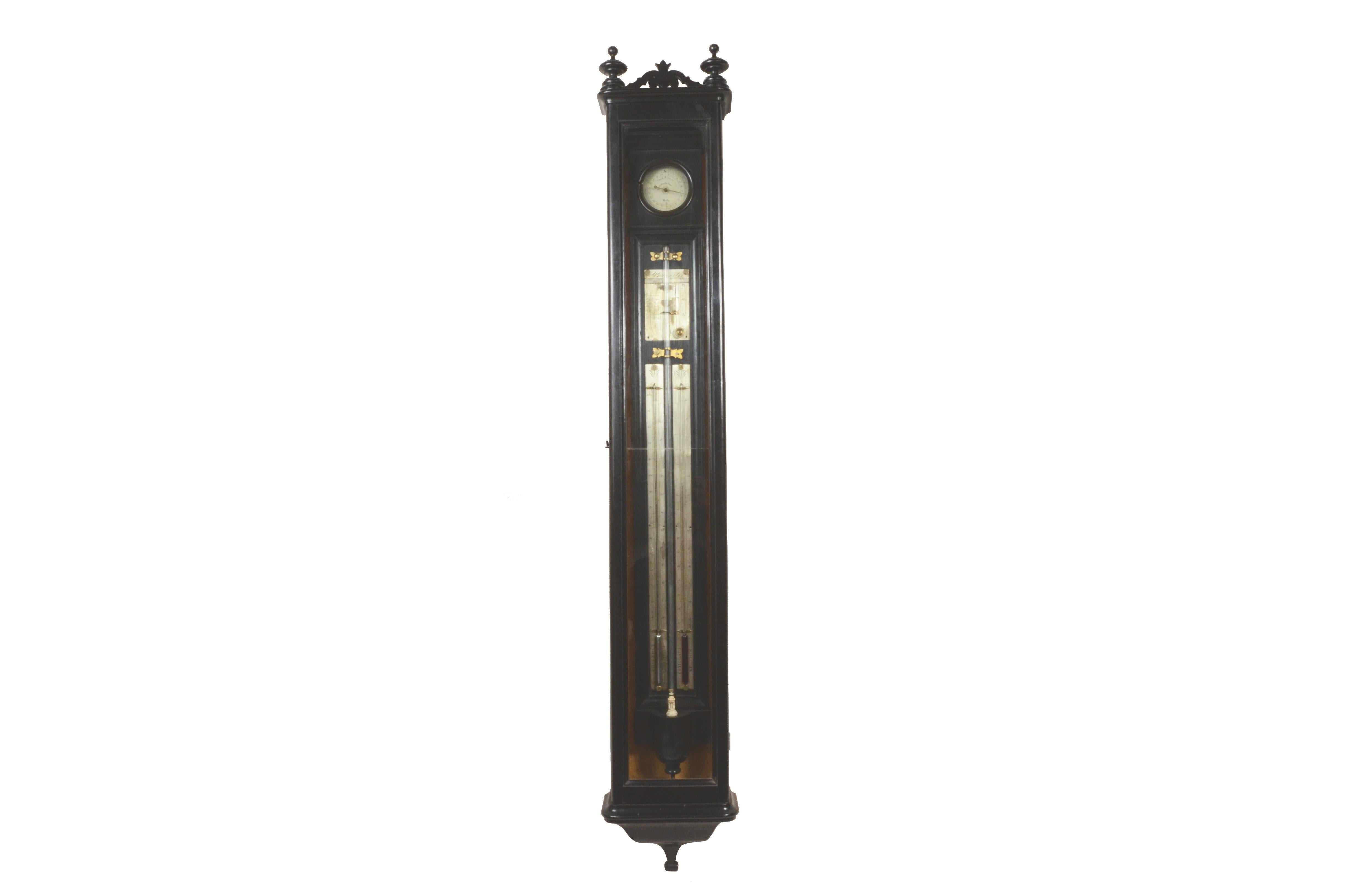 Ebonized wood cue barometer,  manufacturing in northern Italy  from the early 19th century, housed in an elegant custom-made shrine  glass and ebonized wood with decorative motifs.
Barometer with ebonized wooden tank complete with  sea bone float