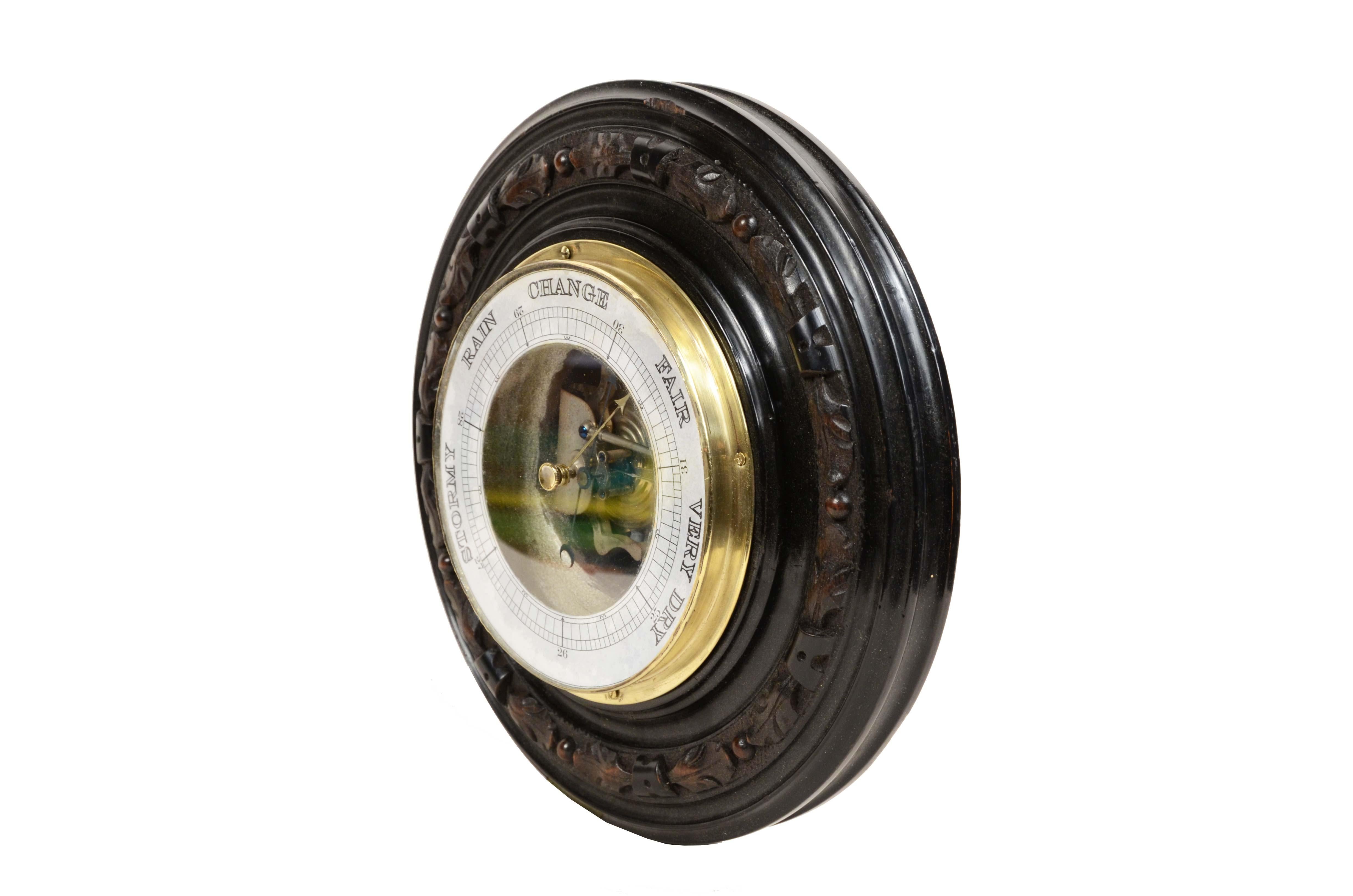 19th Century Aneroid wall barometer in carved wood brass and glass late 19th century. For Sale