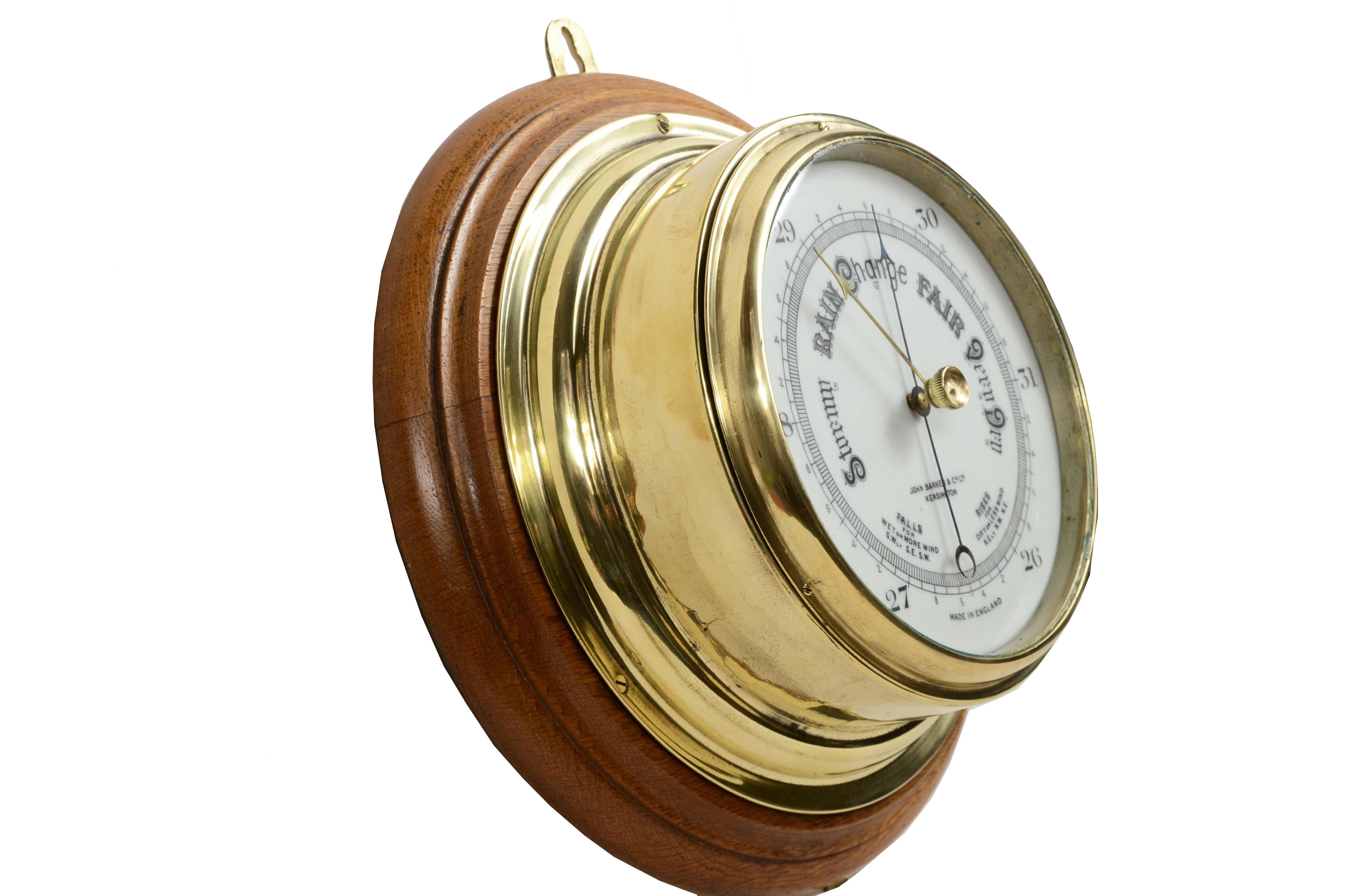 Brass wall-mounted aneroid barometer  signed John Barker & Son, early 1900s. 6