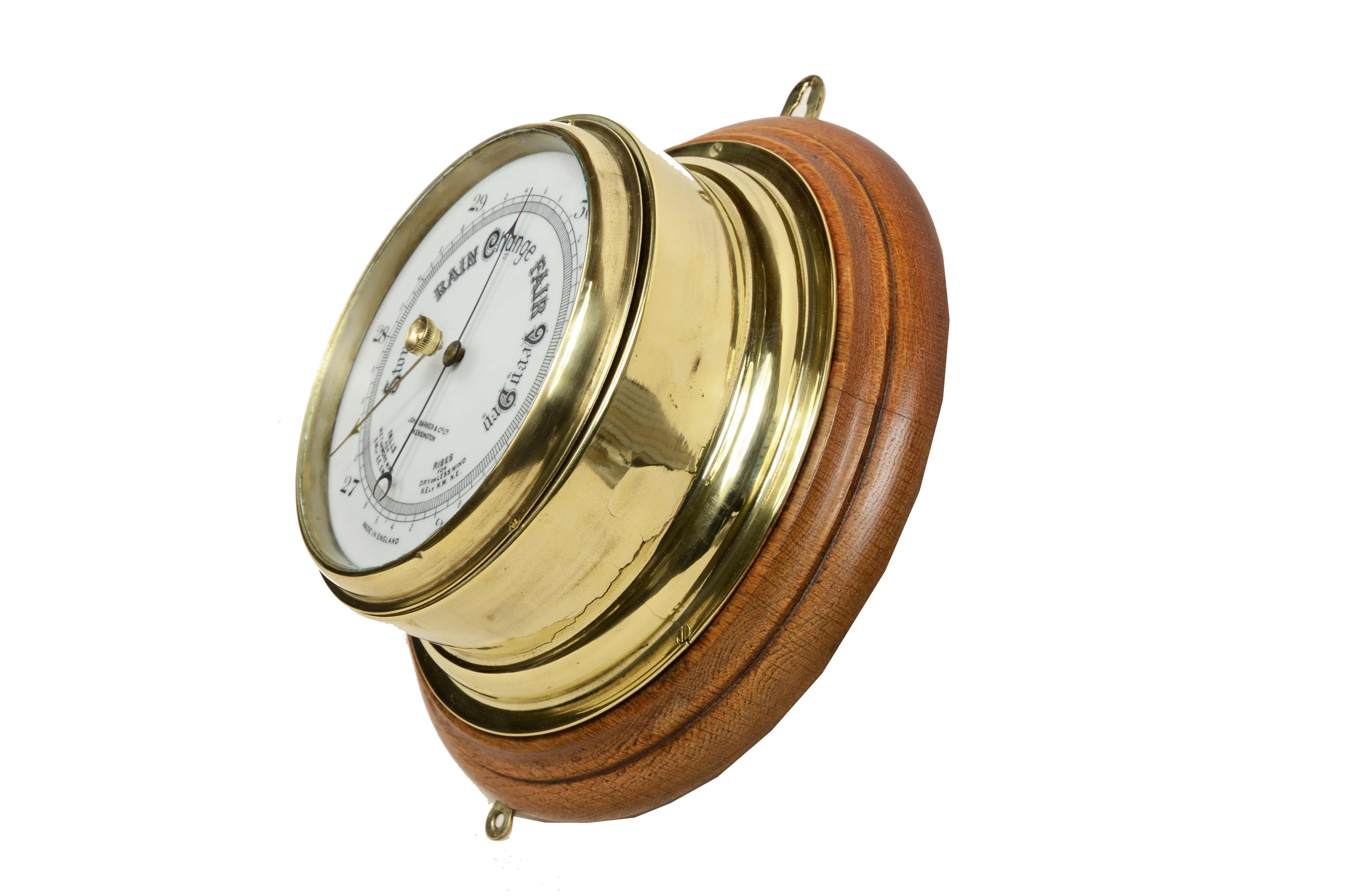Brass wall-mounted aneroid barometer  signed John Barker & Son, early 1900s. 7