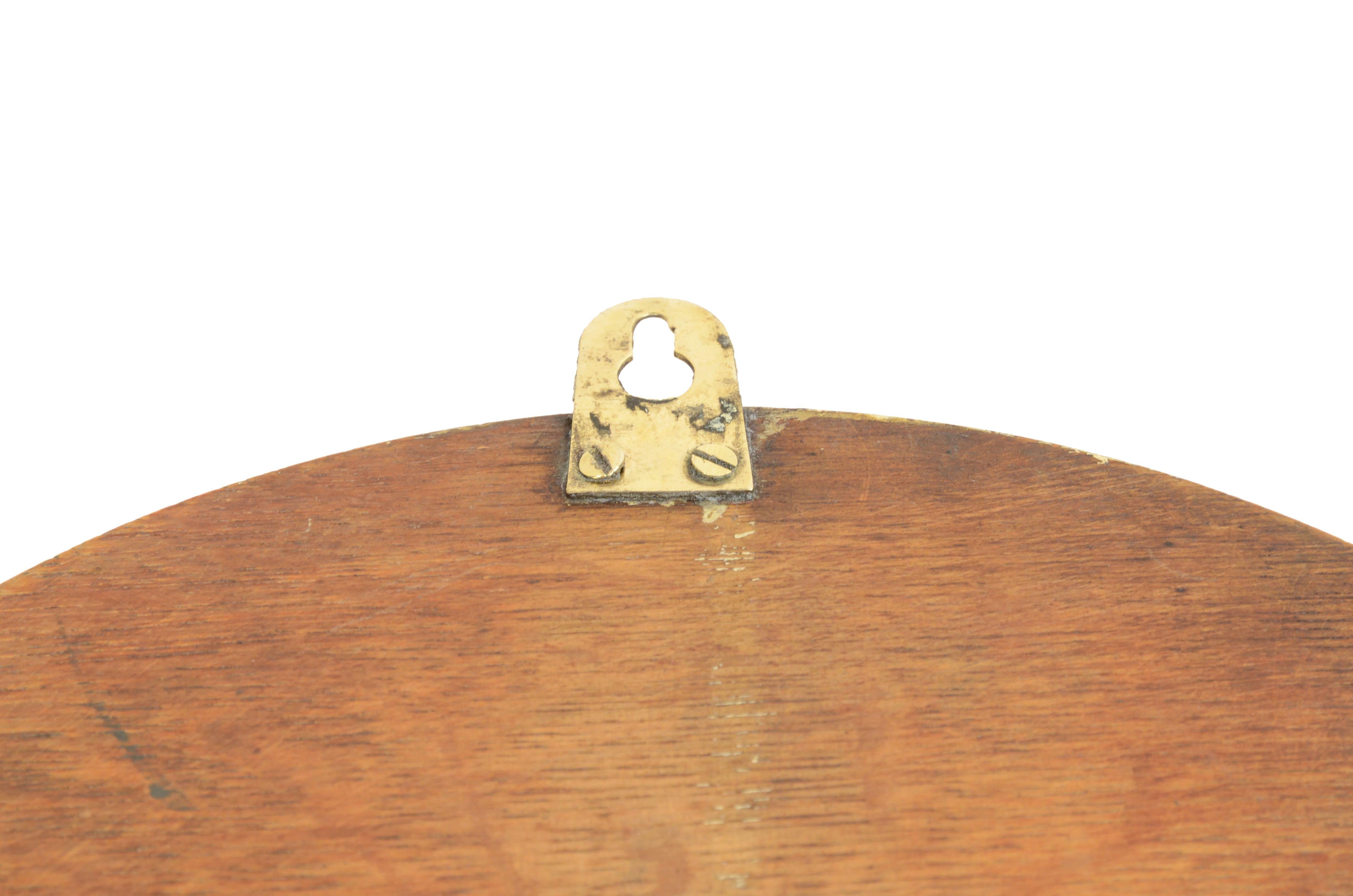 Brass wall-mounted aneroid barometer  signed John Barker & Son, early 1900s. 11
