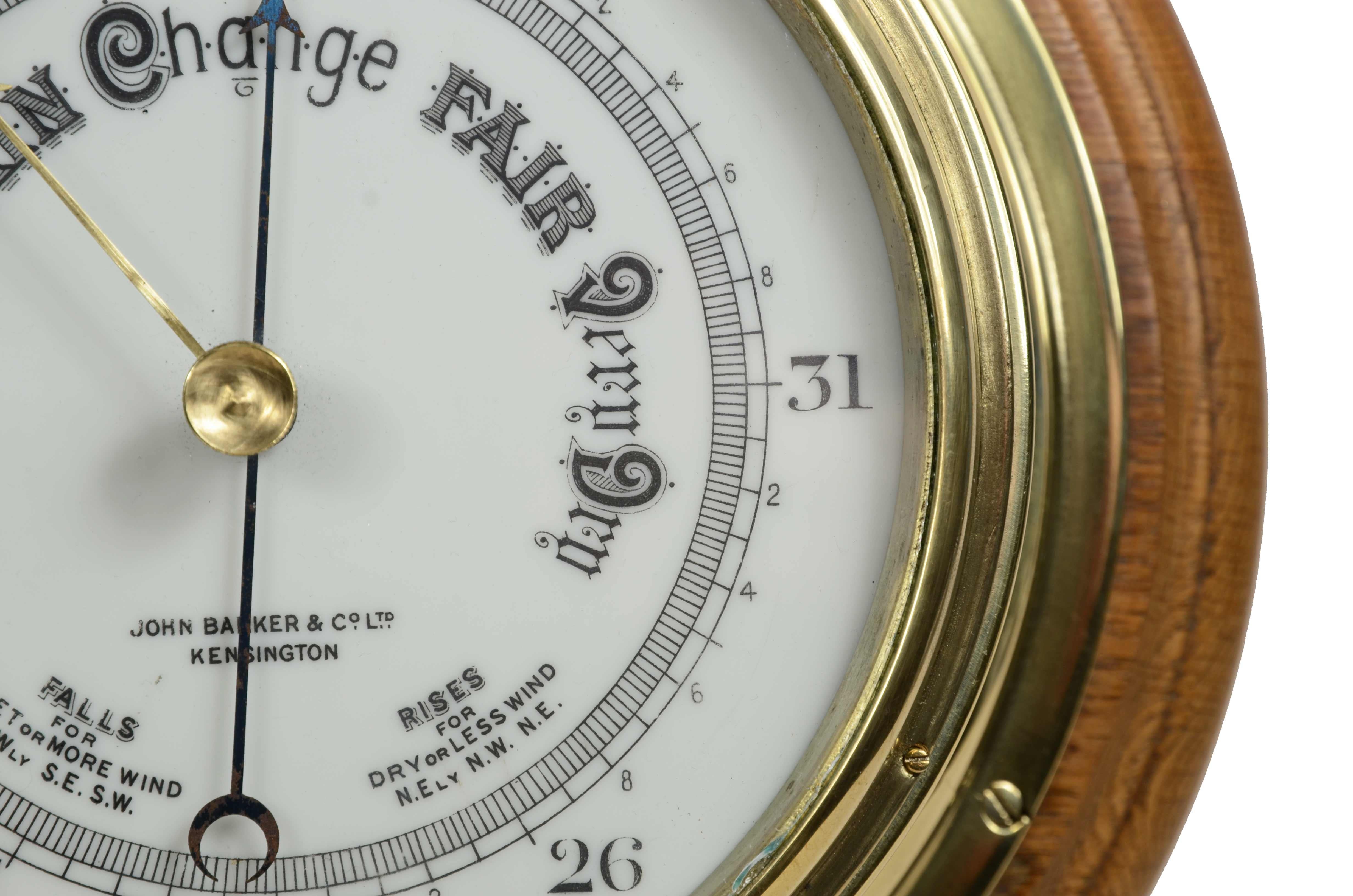 Brass wall-mounted aneroid barometer  signed John Barker & Son, early 1900s. 2