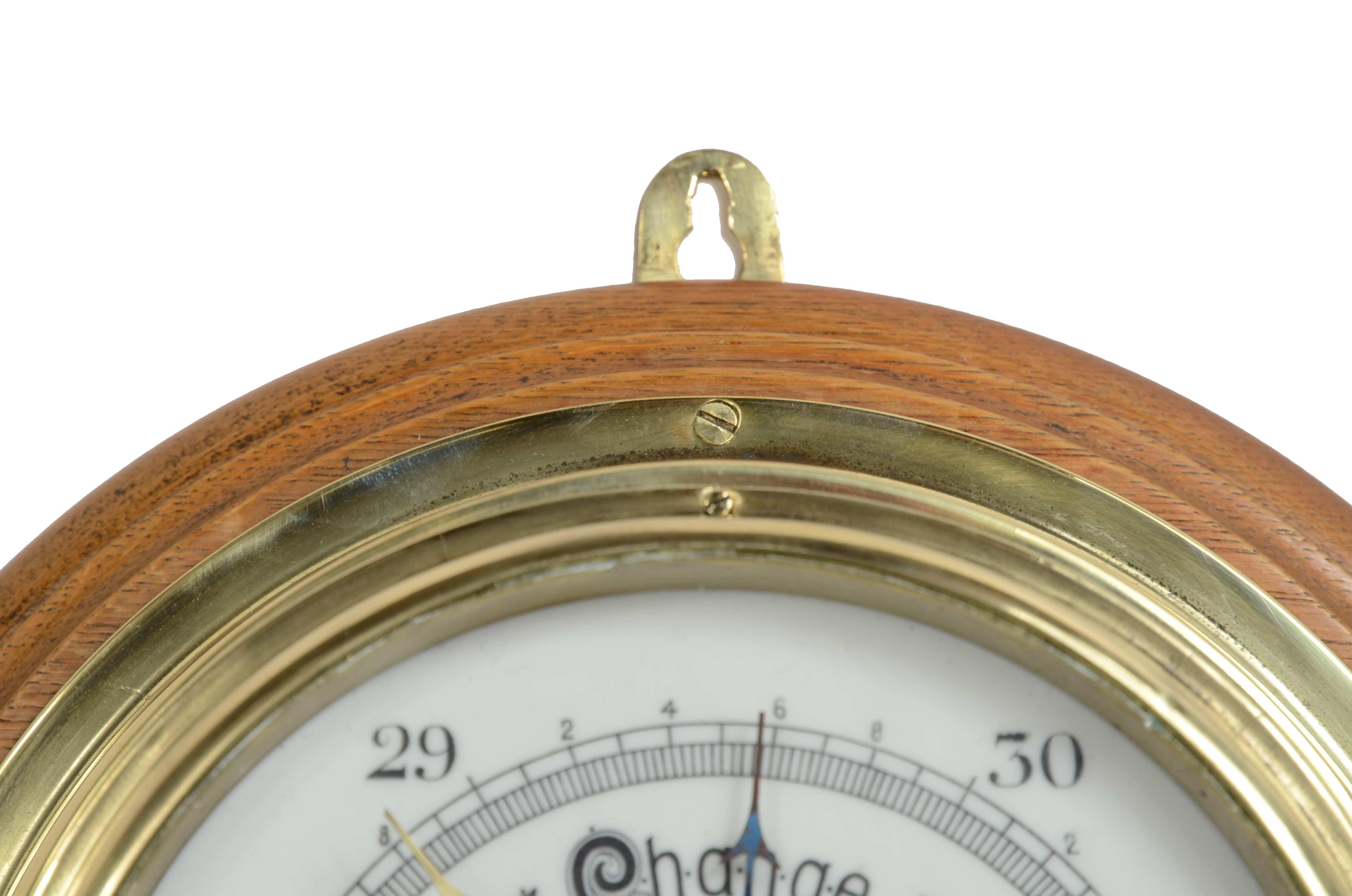 Brass wall-mounted aneroid barometer  signed John Barker & Son, early 1900s. 3