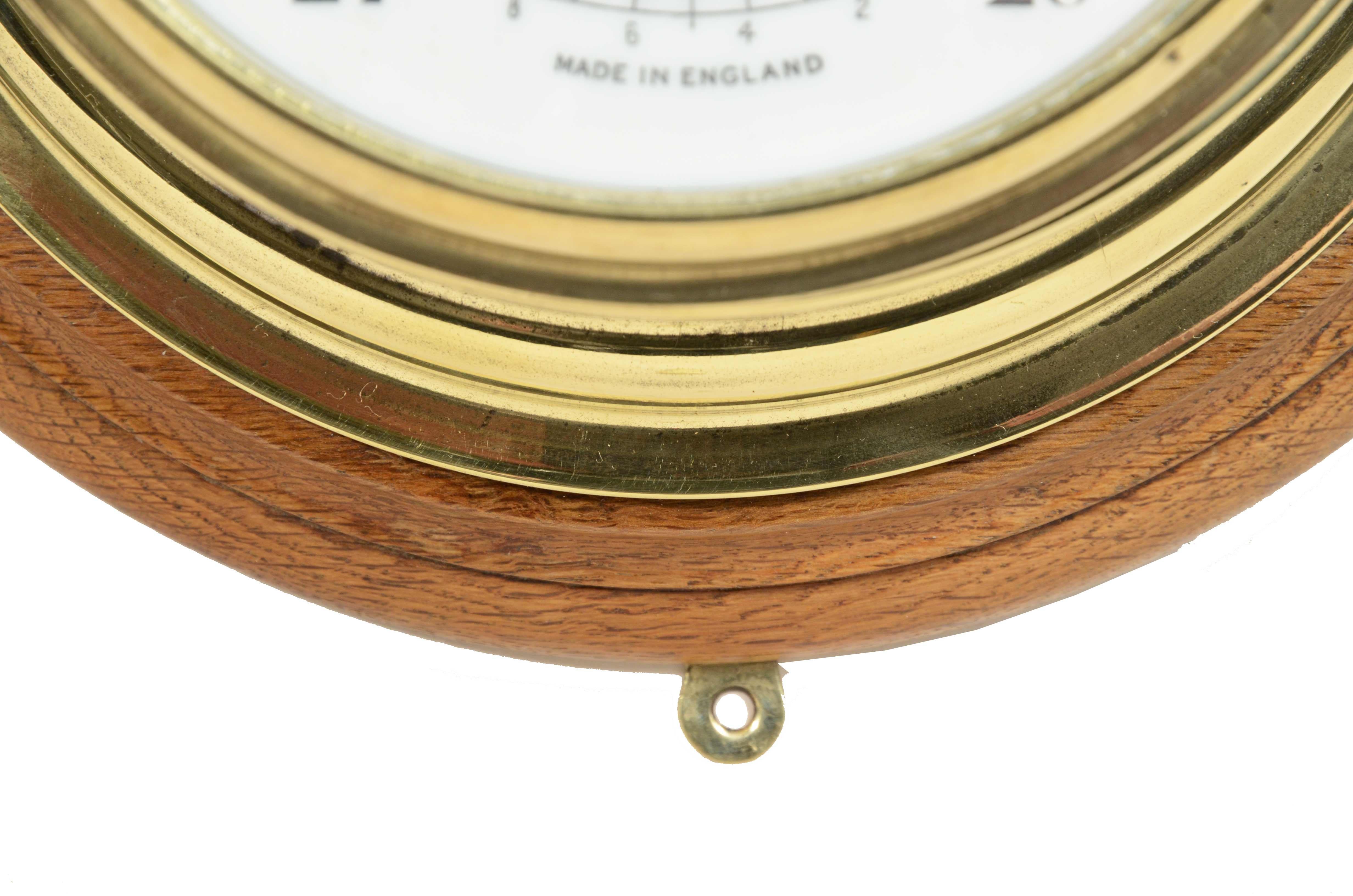 Brass wall-mounted aneroid barometer  signed John Barker & Son, early 1900s. 4
