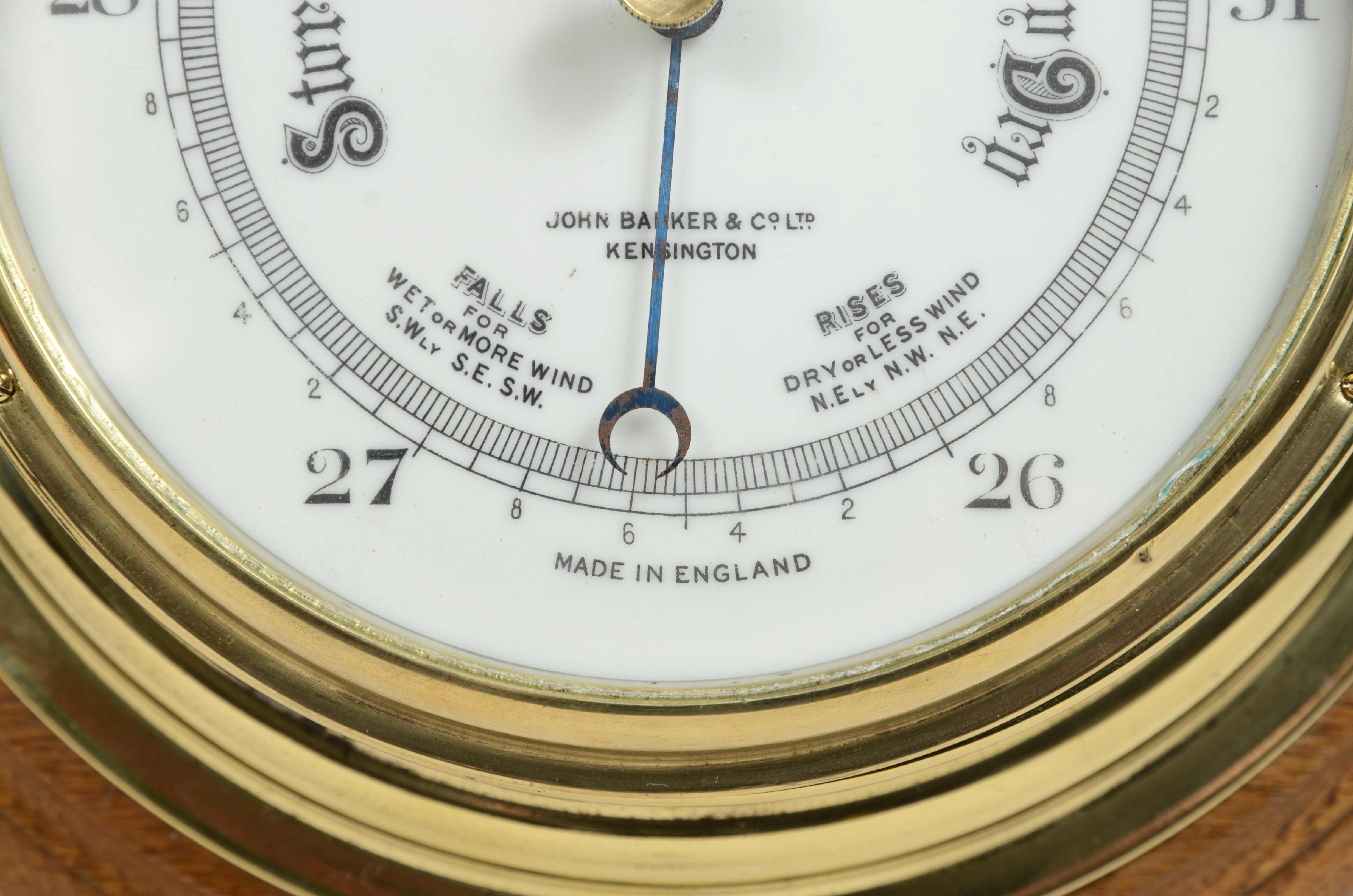 Brass wall-mounted aneroid barometer  signed John Barker & Son, early 1900s. 5