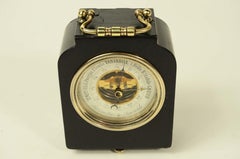 Aneroid barometer within black painted wooden base Italy late 1800s