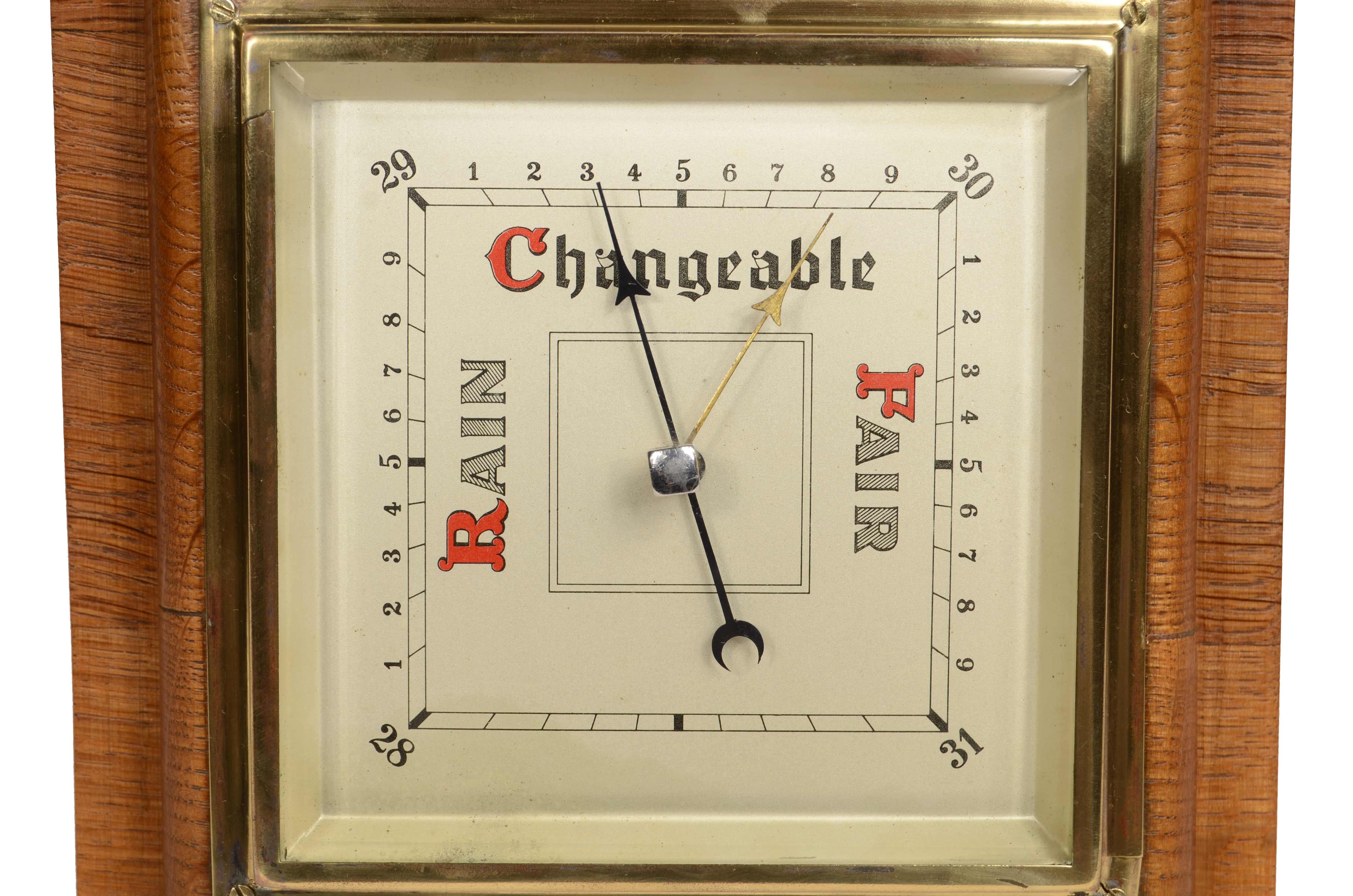 Square-shaped English aneroid wall barometer made of oak wood from the 1940s. Good working condition. 
Measures cm19x5x19 - inches 7.5x1.9x7.5.
The last photo is the gift box.
This is an ancient measuring instrument whose pressure-sensitive organ is