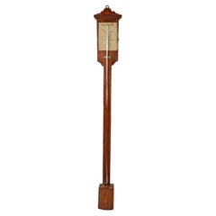 Torricellian cue barometer on oak wood table Germany 1870