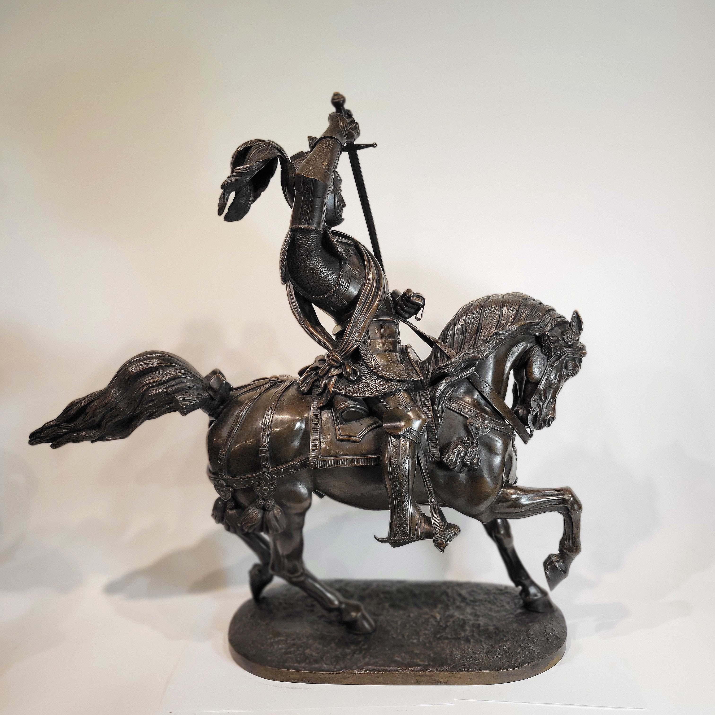 An Italian bronze equestrian sculpture of Emanuele Filiberto, Duke of Savoia, by Baron Carlo Marochetti, the duke wearing full armour with the visor of his helmet up and drawing his sword in front of his face, riding a prancing horse, the base