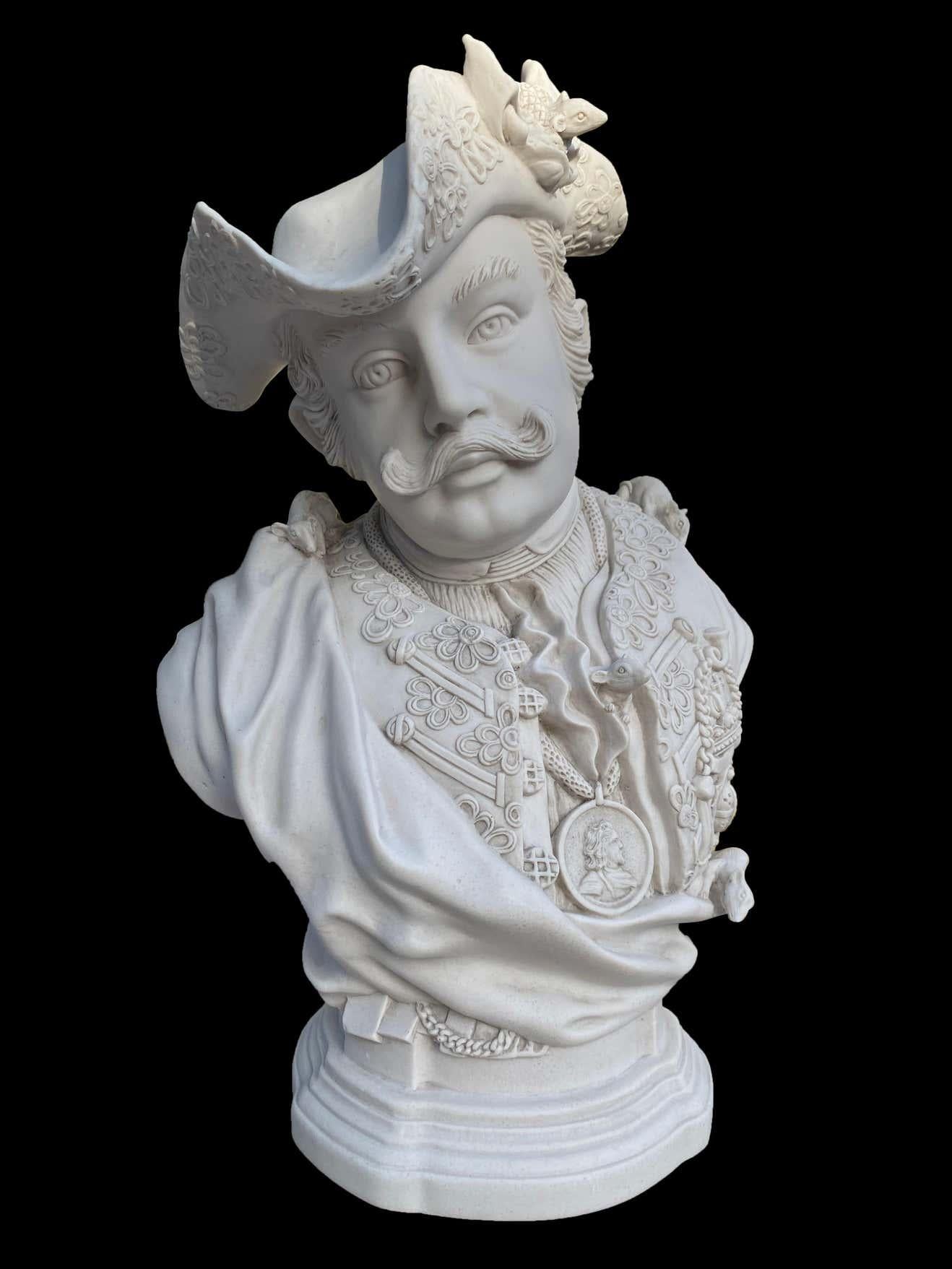 A stunning Baron Schmiedel bust sculpture, 20th century.

Made in 1739, this satirical portrait bust of the court jester Johann Gottfried Tuscheer known as Baron Schmiedel, was one of the last Royal commissions for the Japanese Palace of Augustus