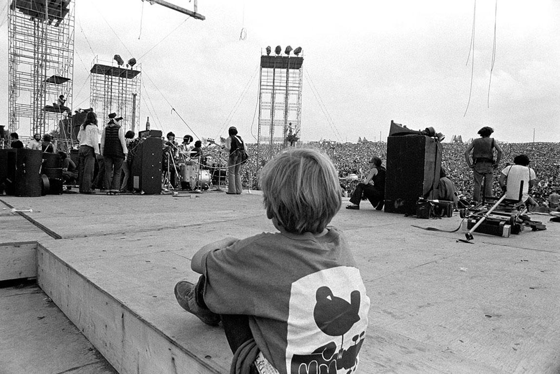 Baron Wolman Black and White Photograph - Woodstock 1969, Child Backstage During Santana
