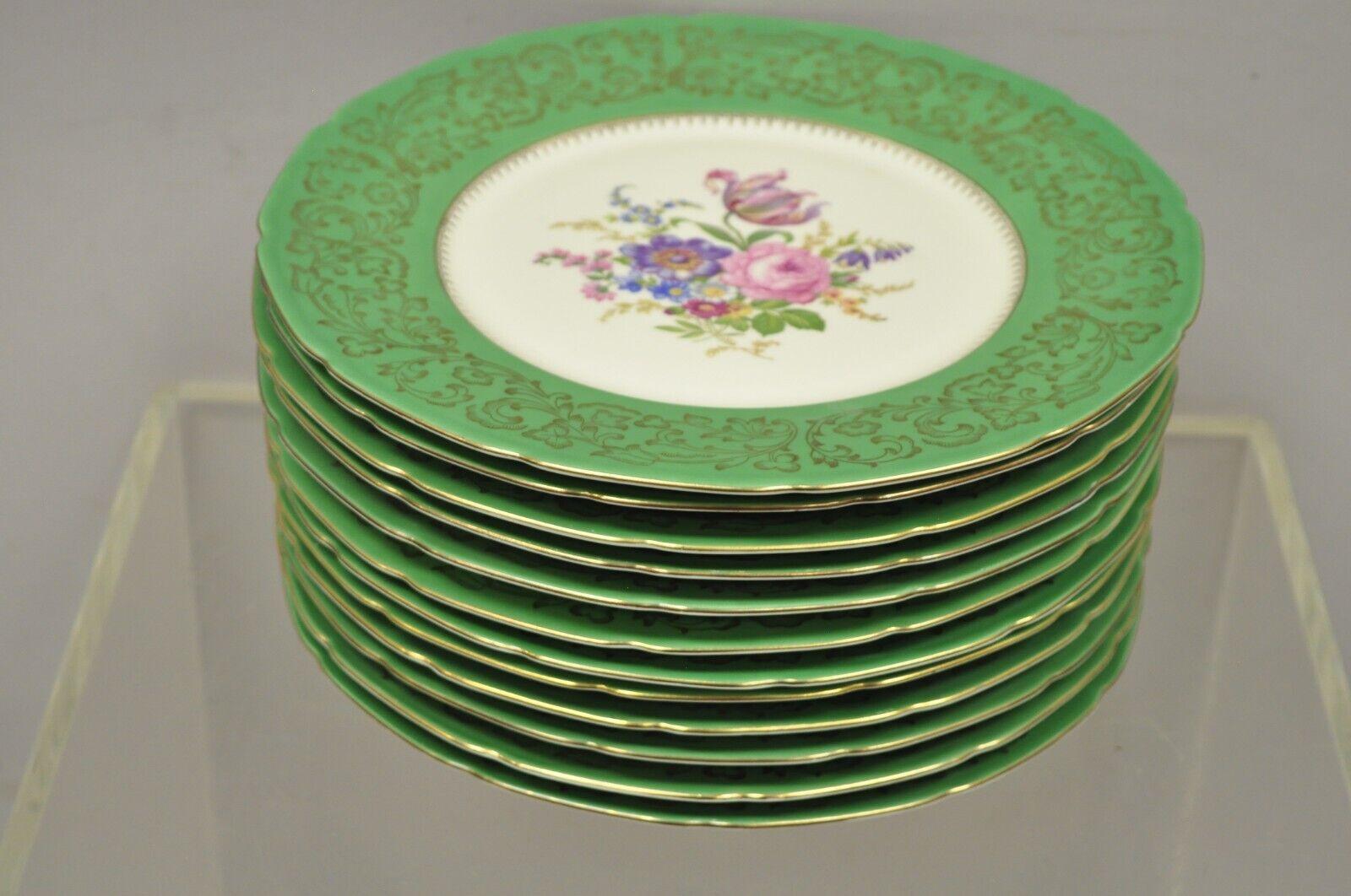 Baronet Bohemia Czechoslovakia floral green rim french dinner plates - Set of 12. Item features gold leaf decorated rim, floral painted center, green boarder, original stamp, very nice antique set. Circa Early 1900s. Measurements: 0.5