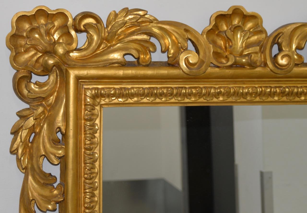 Baroque 19th century monumental hand carved and gilded mirror

This hand carved mirror is quality built with dovetail construction at the corners. 

Heavily carved with acanthus leaves and shells. 

It can be hung vertical, horizontal or free
