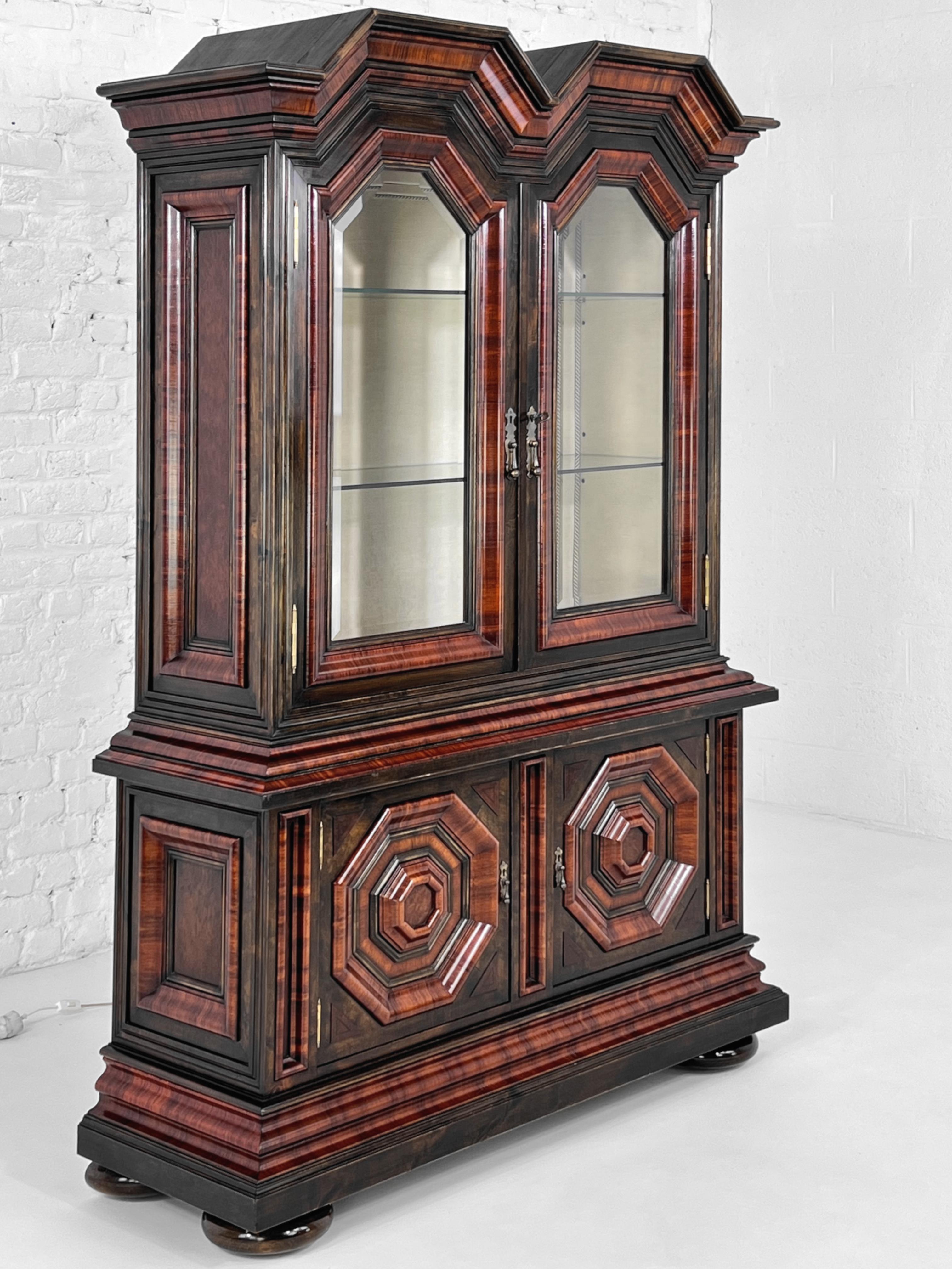 Baroque And Rococo Style Wooden Marquetry and Glass Armoire or Vitrine Cabinet composed of 2 parts:

Up one with vitrine lightened storage spaces, 2 graphic glass panel doors with fine sculpted finishes, opening on glass shelves and beige fabric