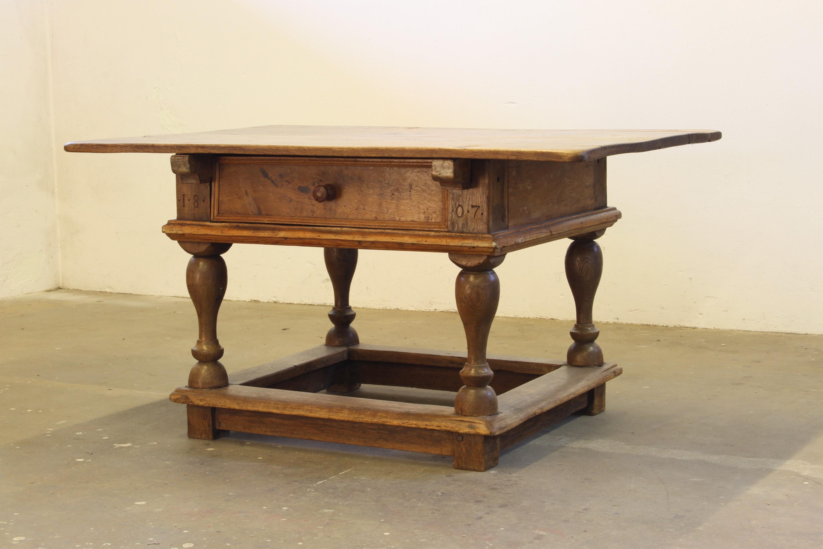 Rare Dated 1807 Solid Oak Farmhouse Baroque Table.

A truly remarkable piece of rural craftsmanship, this heavy and robust solid oak centre table carries with it more than two centuries of history. Dated 1807 (inscribed directly into the wood), it