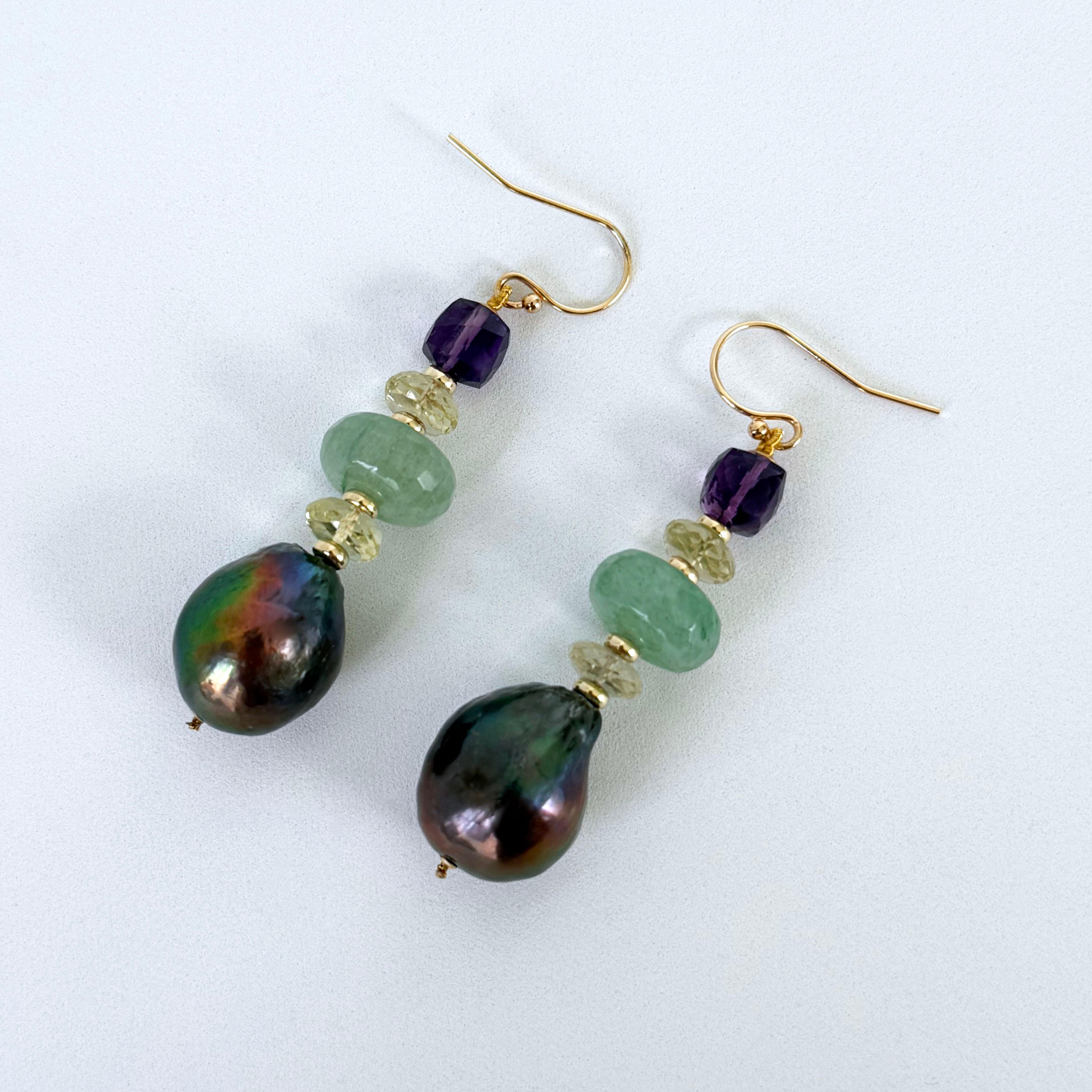Beautiful pair of Earrings by Marina J.

This pair of hook earrings is made of Amethyst, Citrine, Green Chalcedony, Baroque Black Pearls and Solid 14k Yellow Gold. The Black Pearls display a vivid 