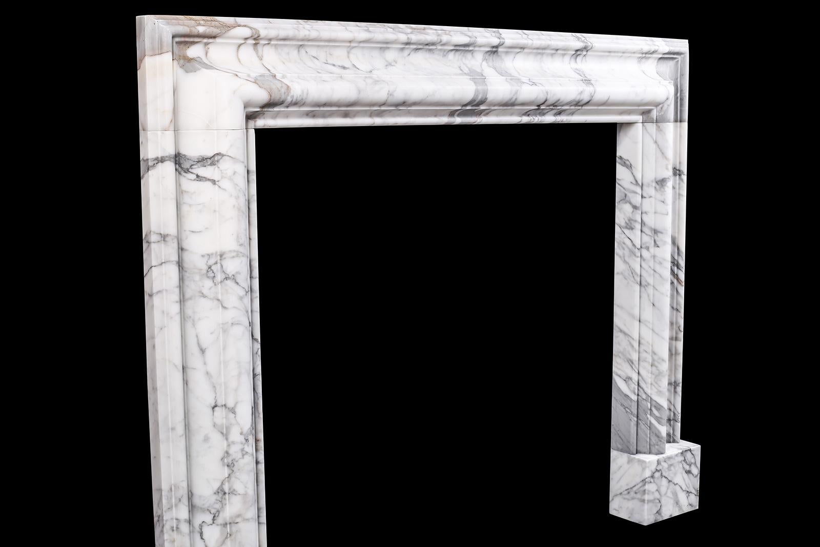 Hand-Carved Baroque Bolection Chimneypiece in Italian White Statuary Marble Fireplace