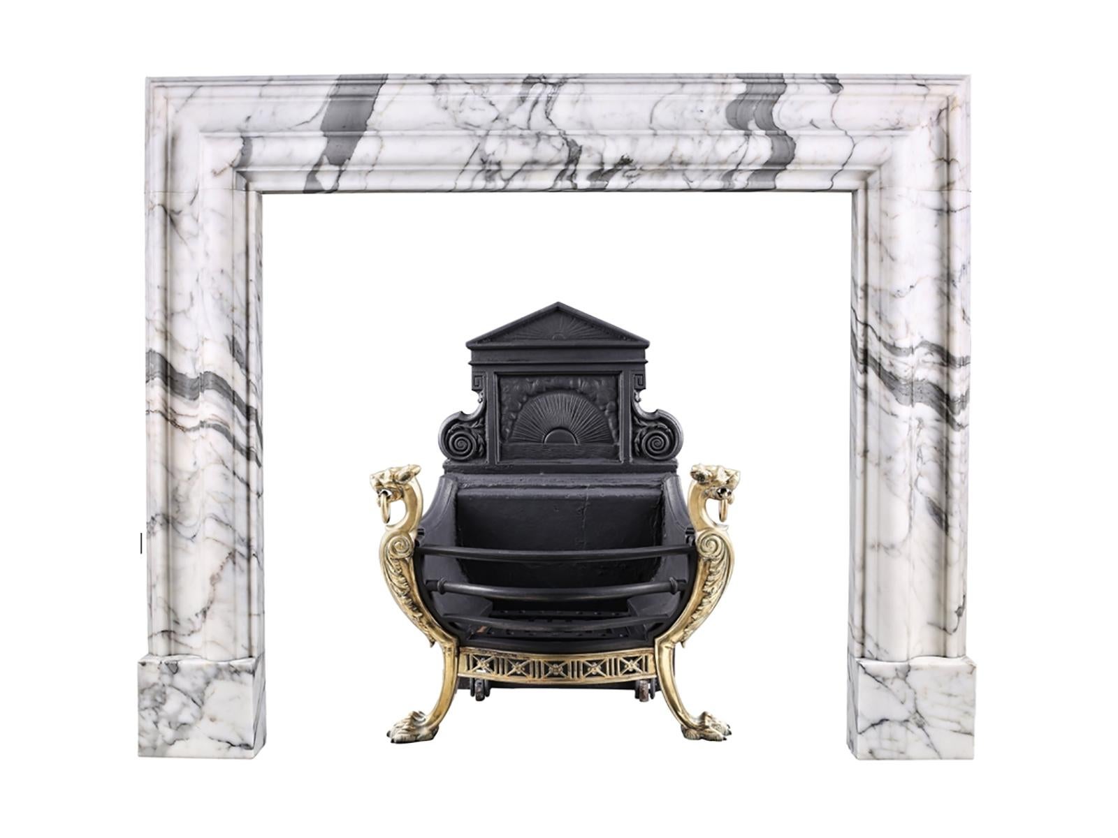 Baroque Bolection fireplace mantel in Italian White Statuary Marble

A Baroque style Bolection fireplace surround of bold proportions with very finely carved columns with a rising ogee edging, which are supported on substantial footblocks, in high