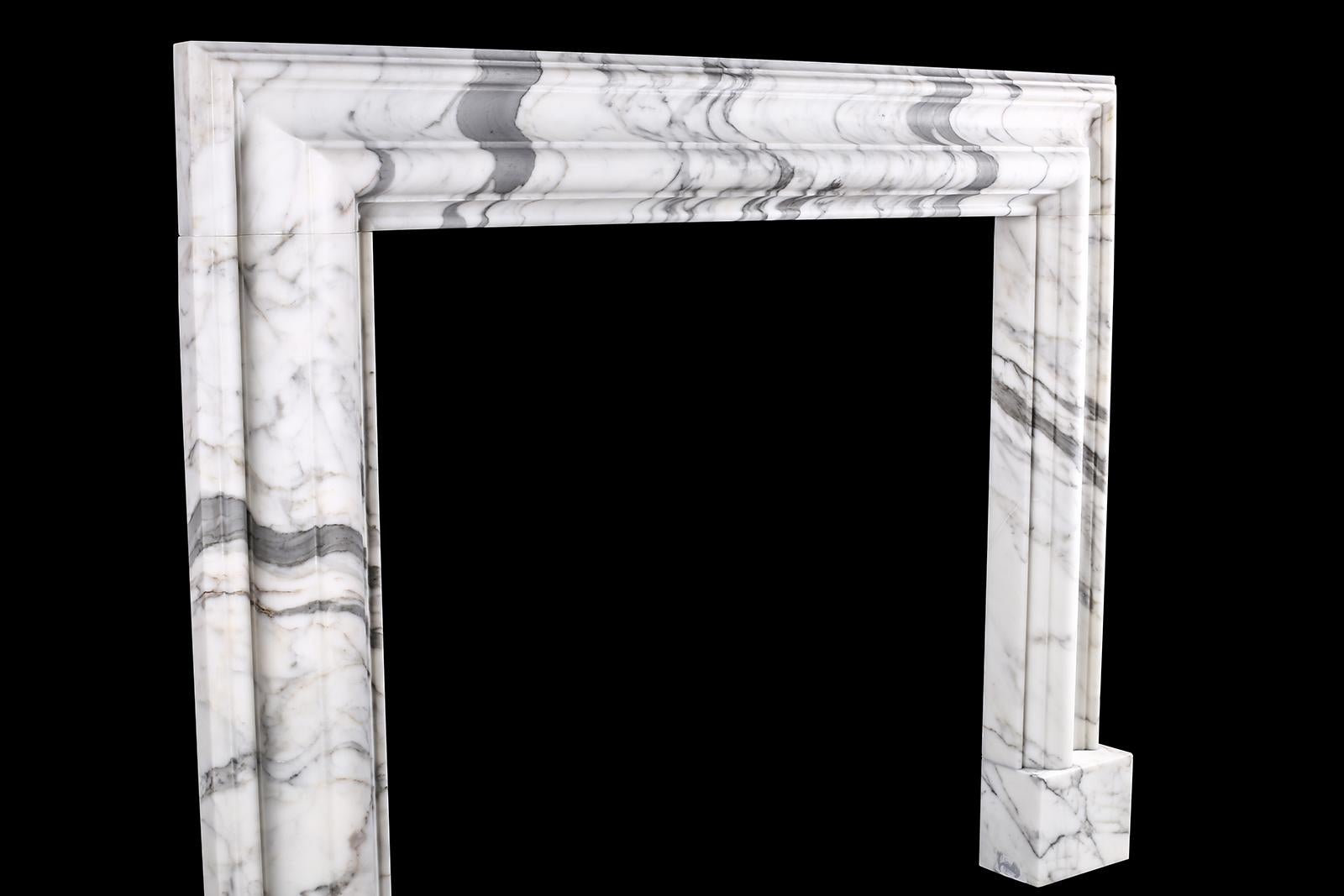 British Baroque Bolection Fireplace Mantel in Italian White Statuary Marble For Sale