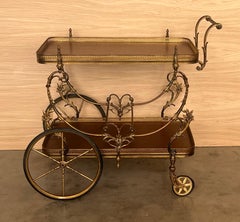 Carrito de té o bar de dos pisos en bronce barroco