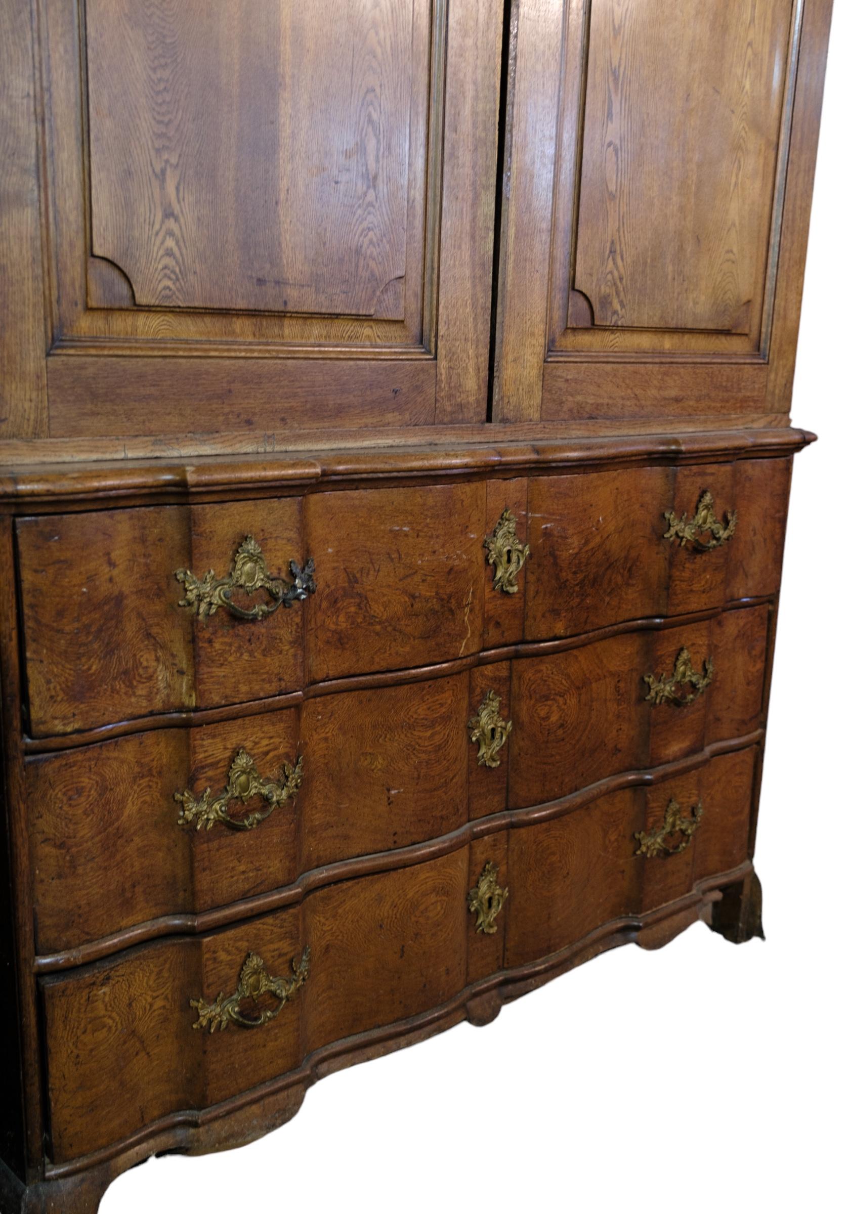 Mid-18th Century Baroque cabinet with drawers made of baroque oak from 1740s For Sale