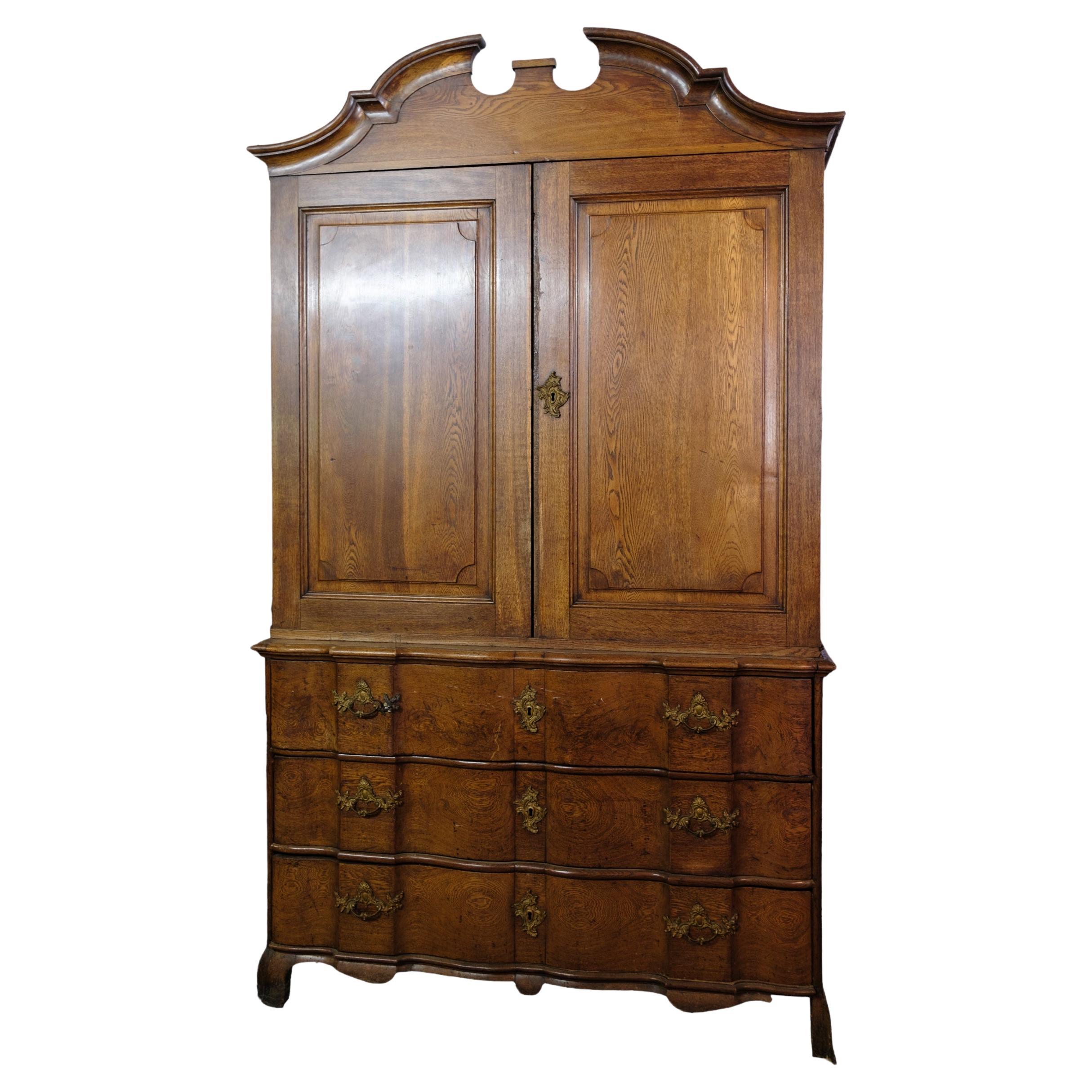 Baroque cabinet with drawers made of baroque oak from 1740s For Sale