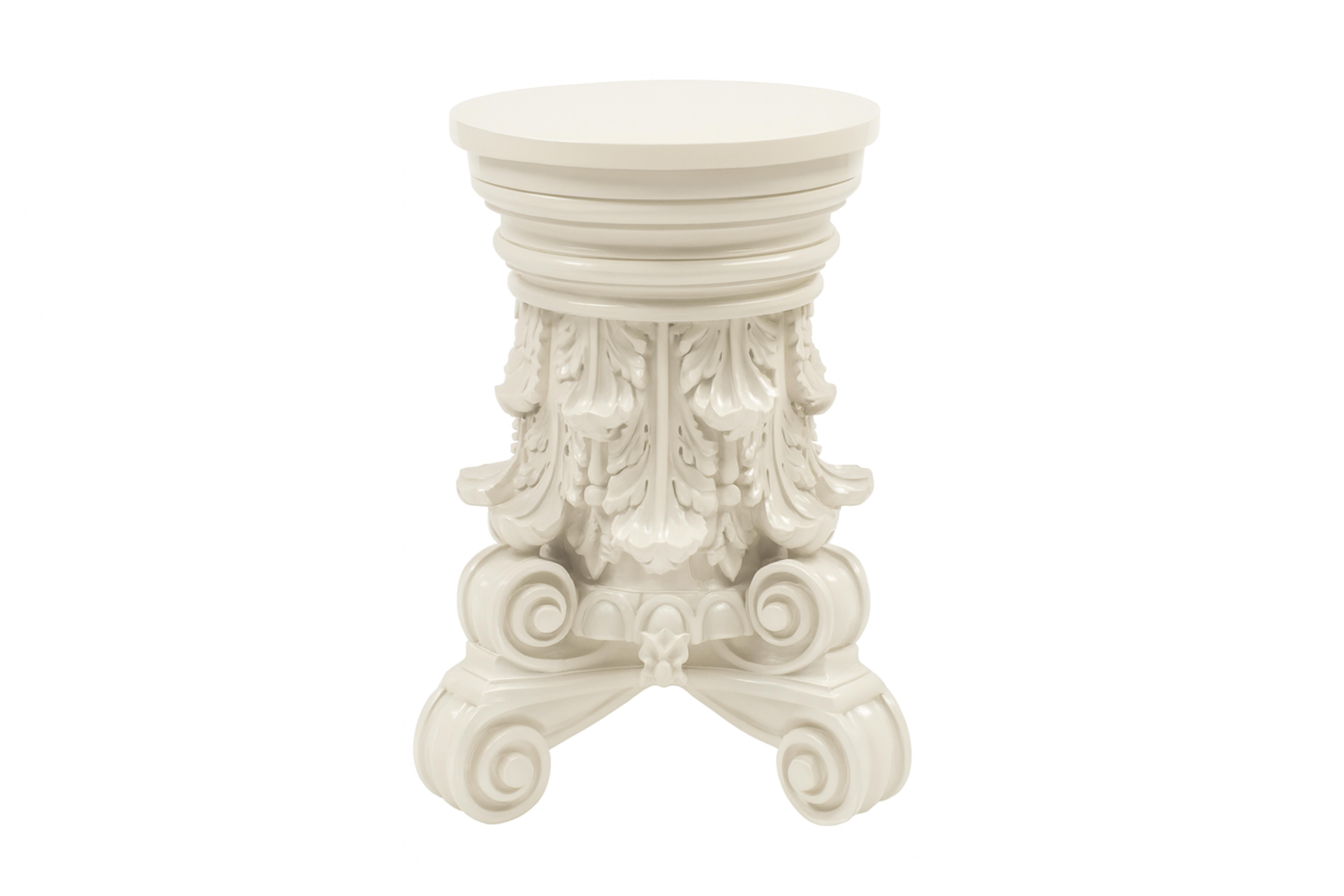 Enhance your space with this artisanal Italian guéridon, expertly refinished in a sleek off-white lacquer (color reference: #F2F0EF) with a high-gloss sheen Crafted from carved chestnut, it features elegant Corinthian-style elements, including