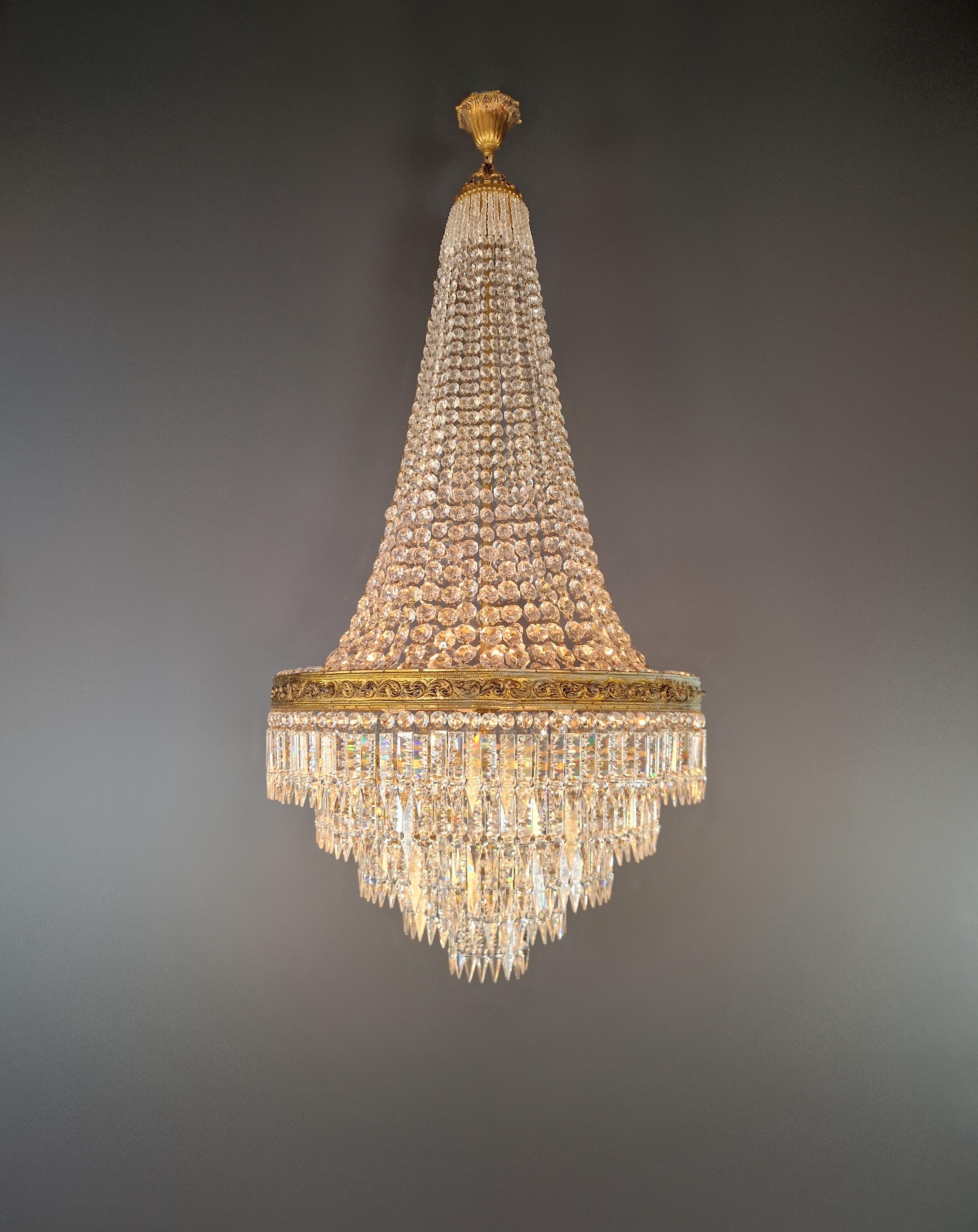 We present an exquisite Art Nouveau brass chandelier – a true rarity and an antique gem. This vintage chandelier was lovingly and expertly restored in Berlin, and its electrical wiring was adapted for smooth operation in the USA. It has been rewired