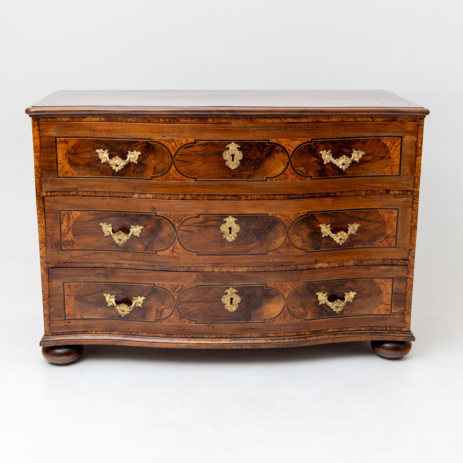 German Baroque Chest of Drawers in Walnut, Inlaywork and Bronze fittings, Mid-18th C. For Sale