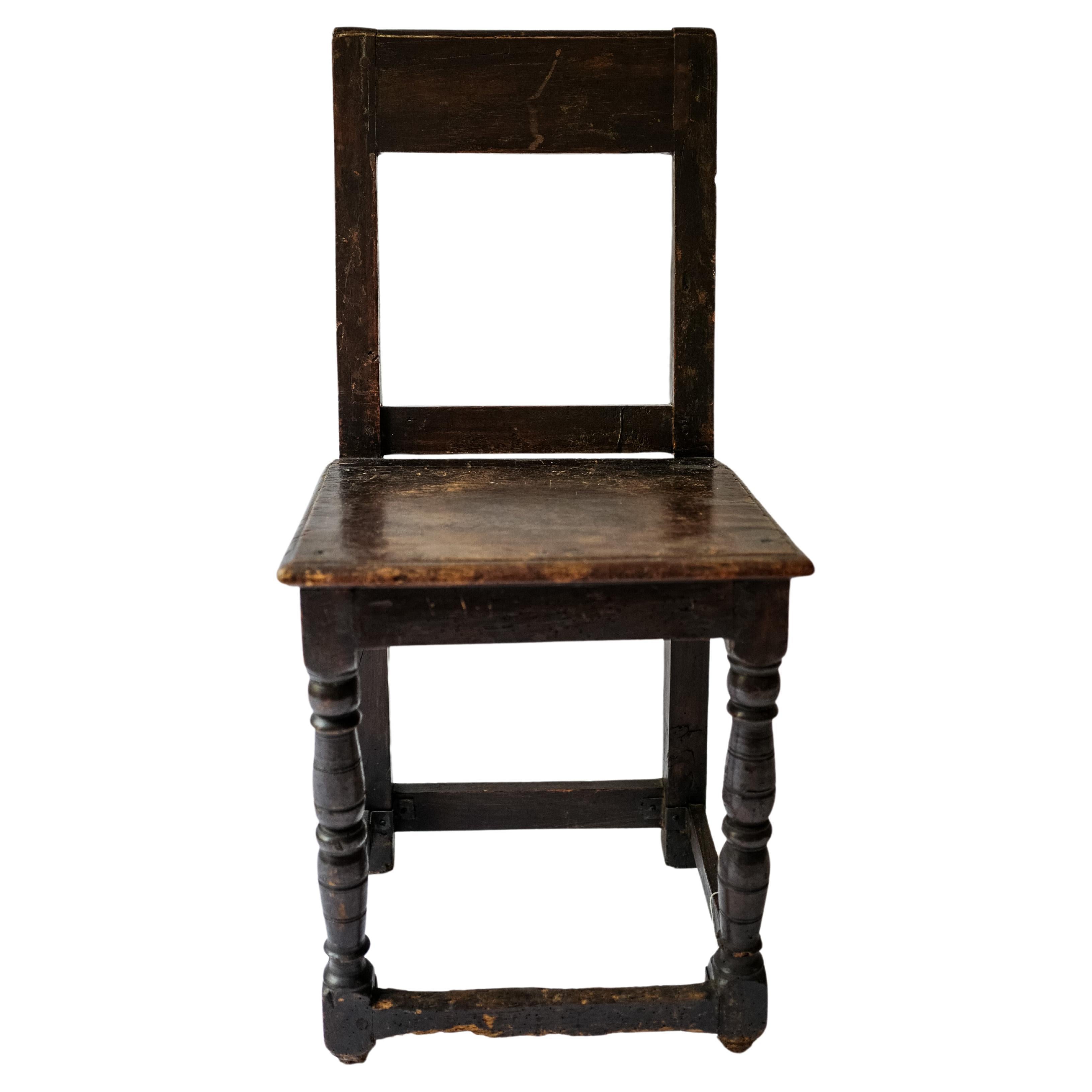 Baroque dark stained oak wood side chair circa 19th Century Sweden For Sale