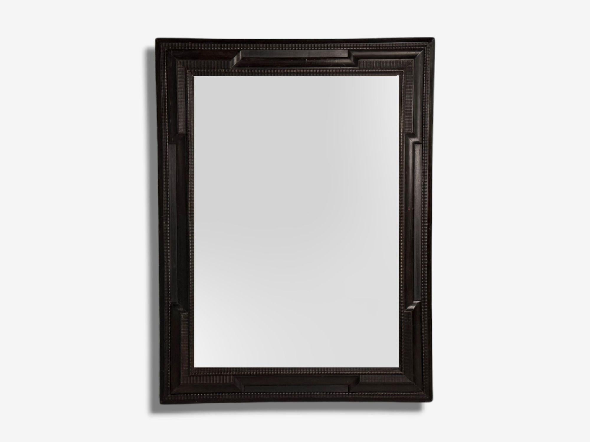 Baroque, Ebonized Wood, Dutch Ripple Frame, Large Wall Mirror, Netherlands, 19th c.

Large example of a 19th century Dutch ripple mirror having it's original hand carved frame and a later distressed central mirror panel. This work features an