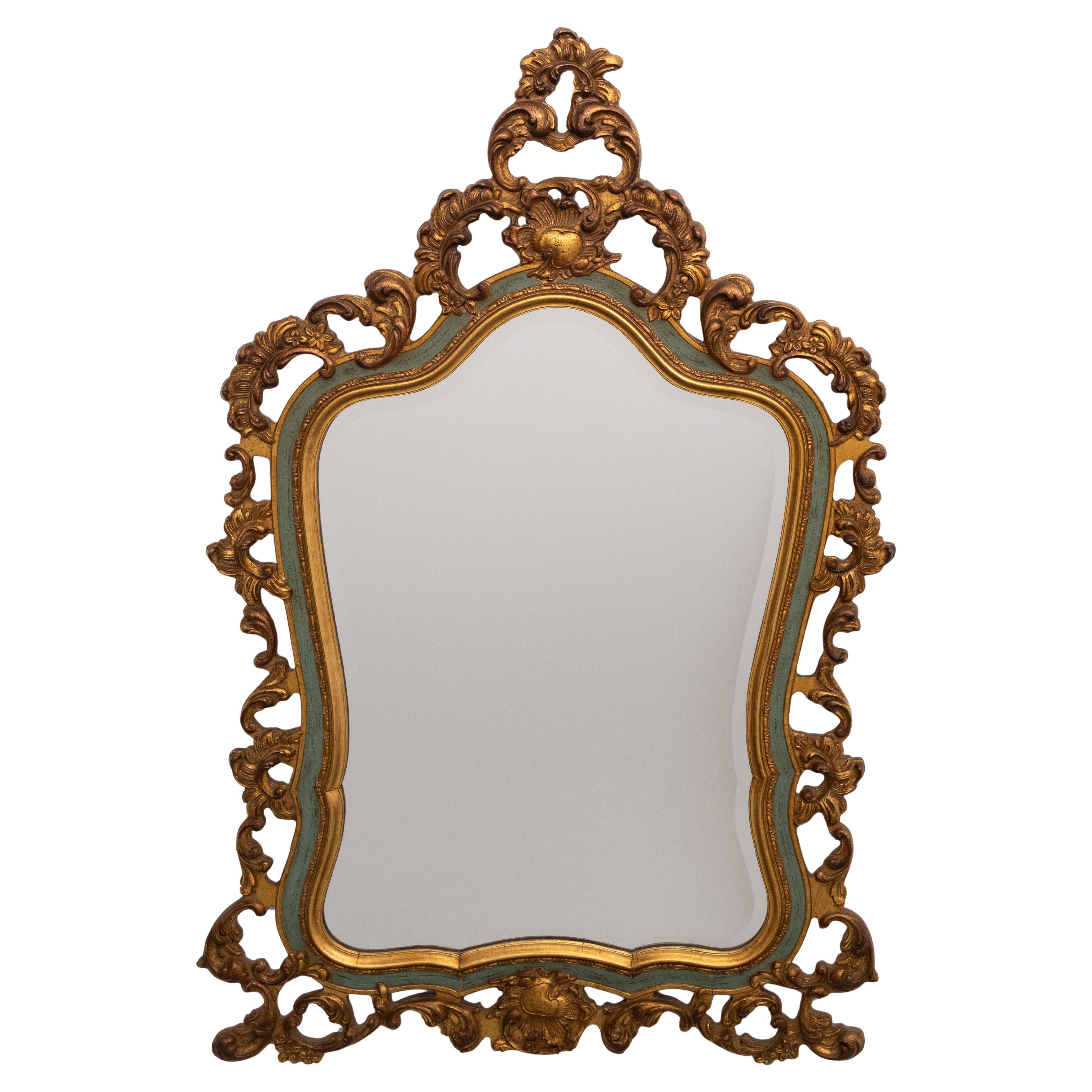 Miroir biseauté baroque doré de style Louis XV avec étiquette " Brevete ", années 1950
