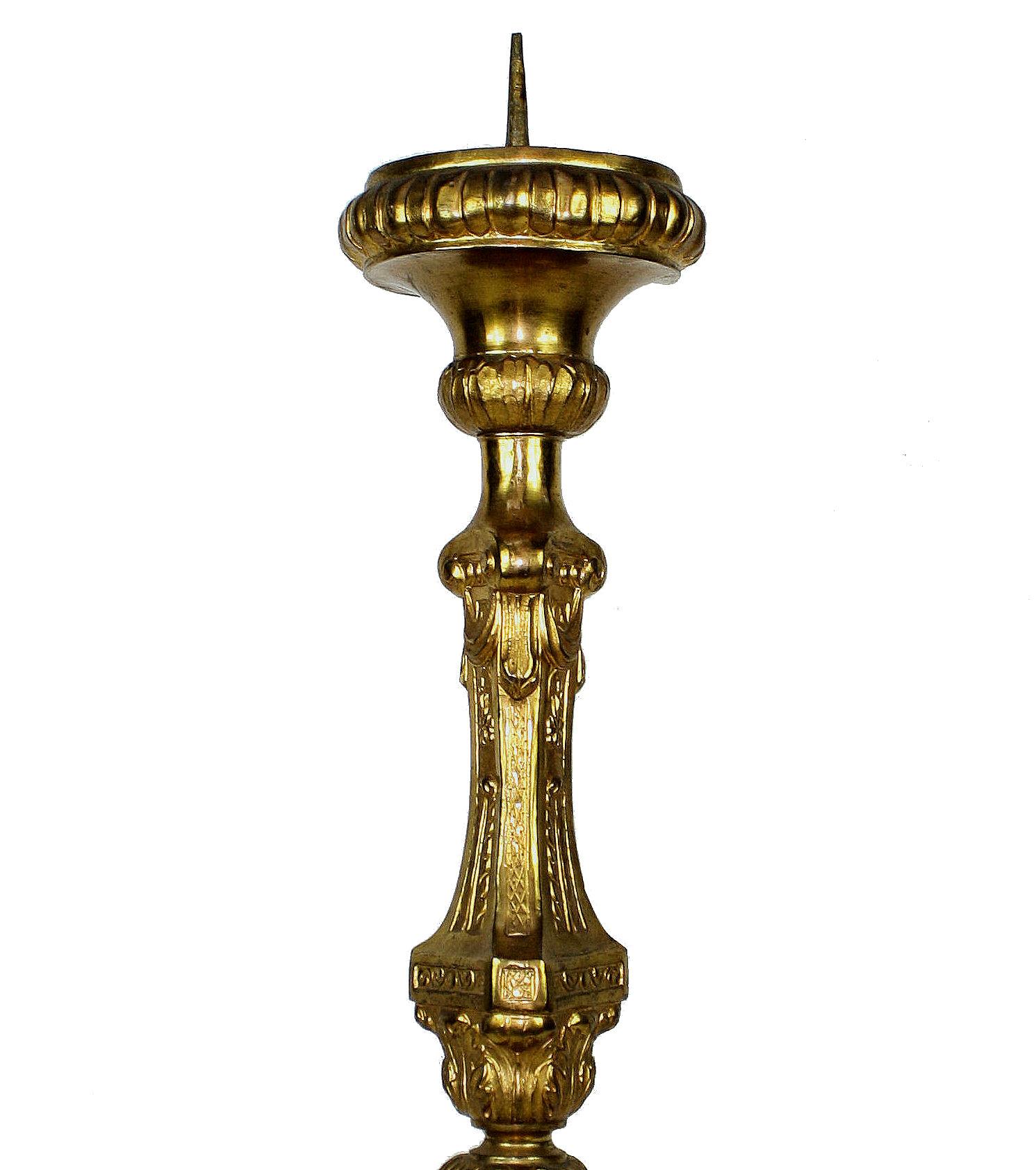 A French baroque gold-plated brass pricket candlestick, beautifully burnished.