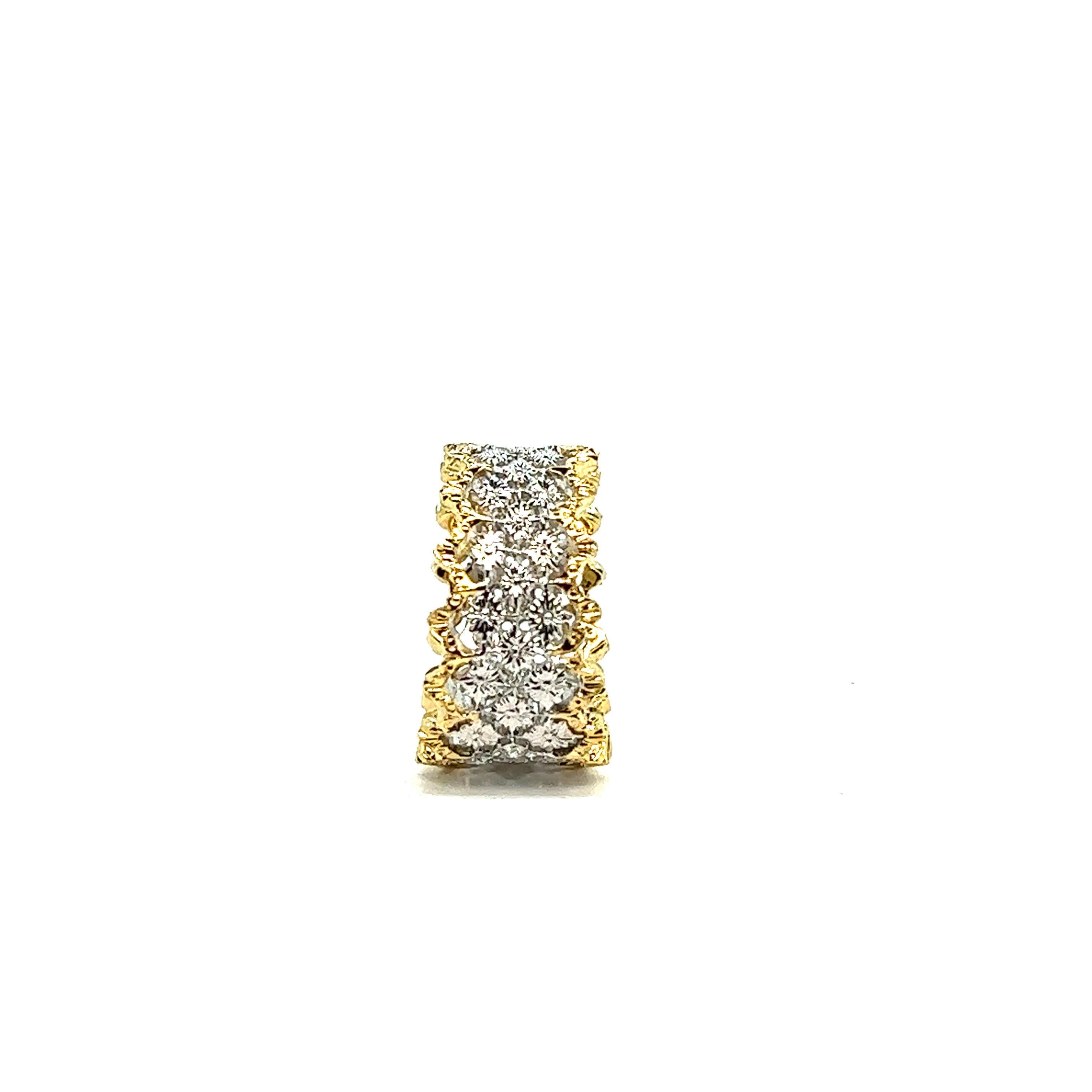 Baroque Lace Ring with 13 Brilliant Cut Diamonds in 18K White and Yellow Gold

This pretty ring of baroque and bohemian style or renaissance style is particularly chiseled and openworked to present the floral decorations. It is set with 13 diamonds