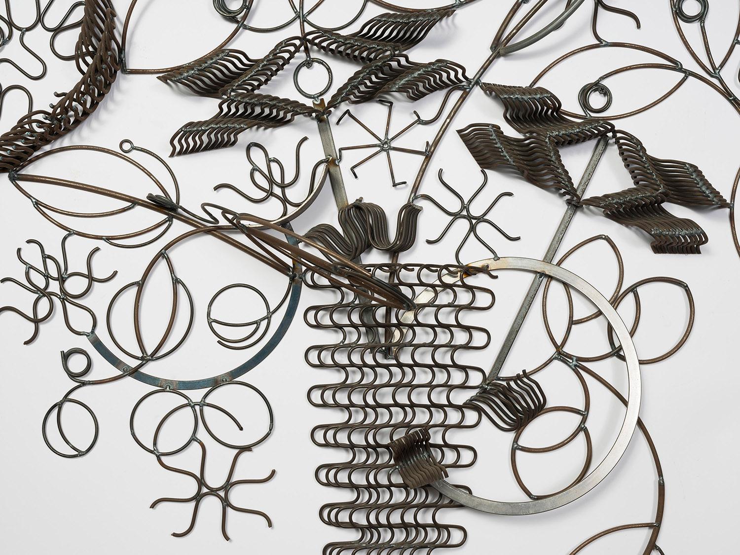 Welded spring and mild steel by
Aswoon/SusanWoods. 

Photo by Kris Graves Photography.