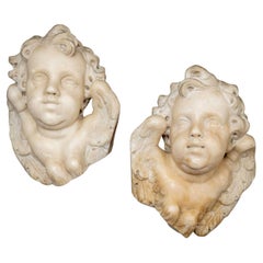 Cabezas de ángel barrocas de mármol, Italia, mediados del siglo XVIII