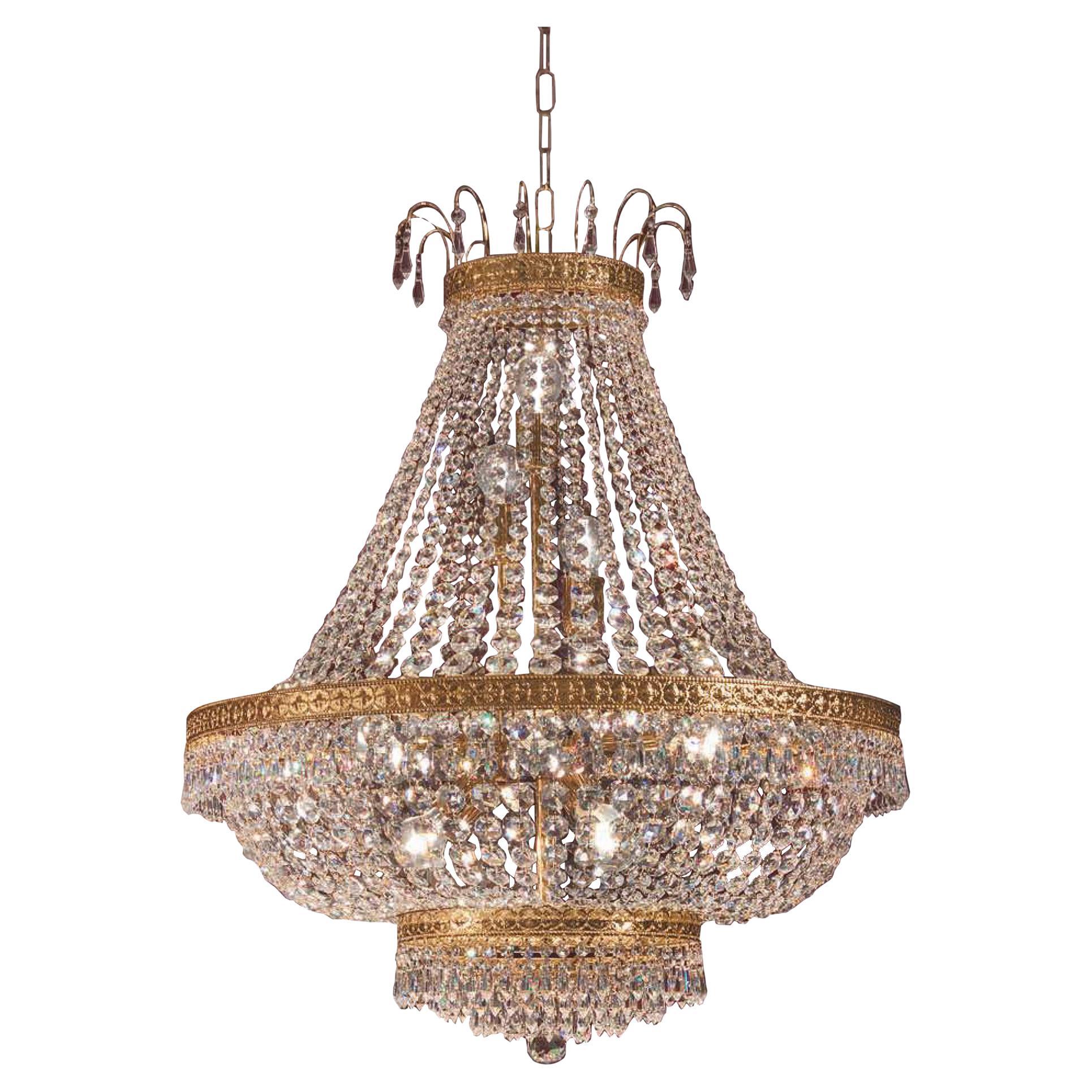 Marvelous 12 Lights Chandelier with Clear Scholer Crystal Plated in 24kt Gold For Sale