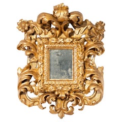 Used Baroque mirror in gilded wood, Rome, Louis XIV.